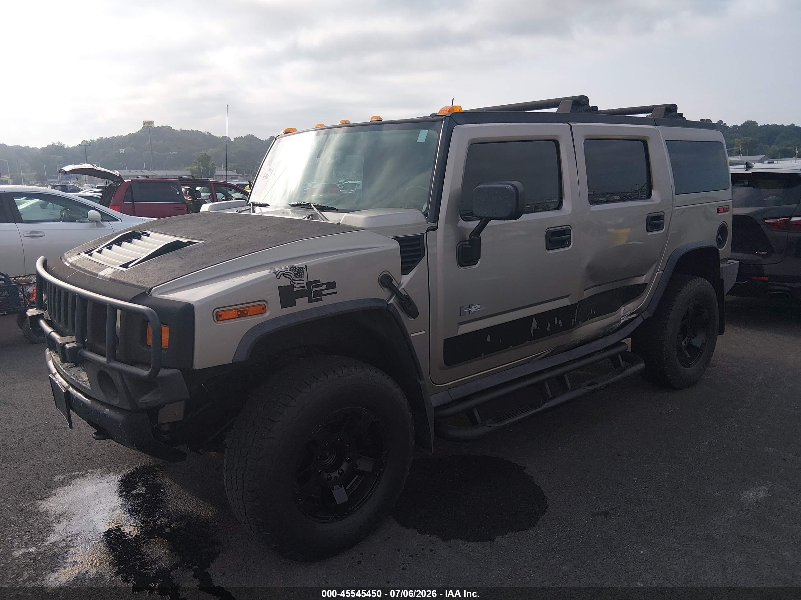2004 Hummer H2   Champagne vin: 5GRGN23UX4H105774