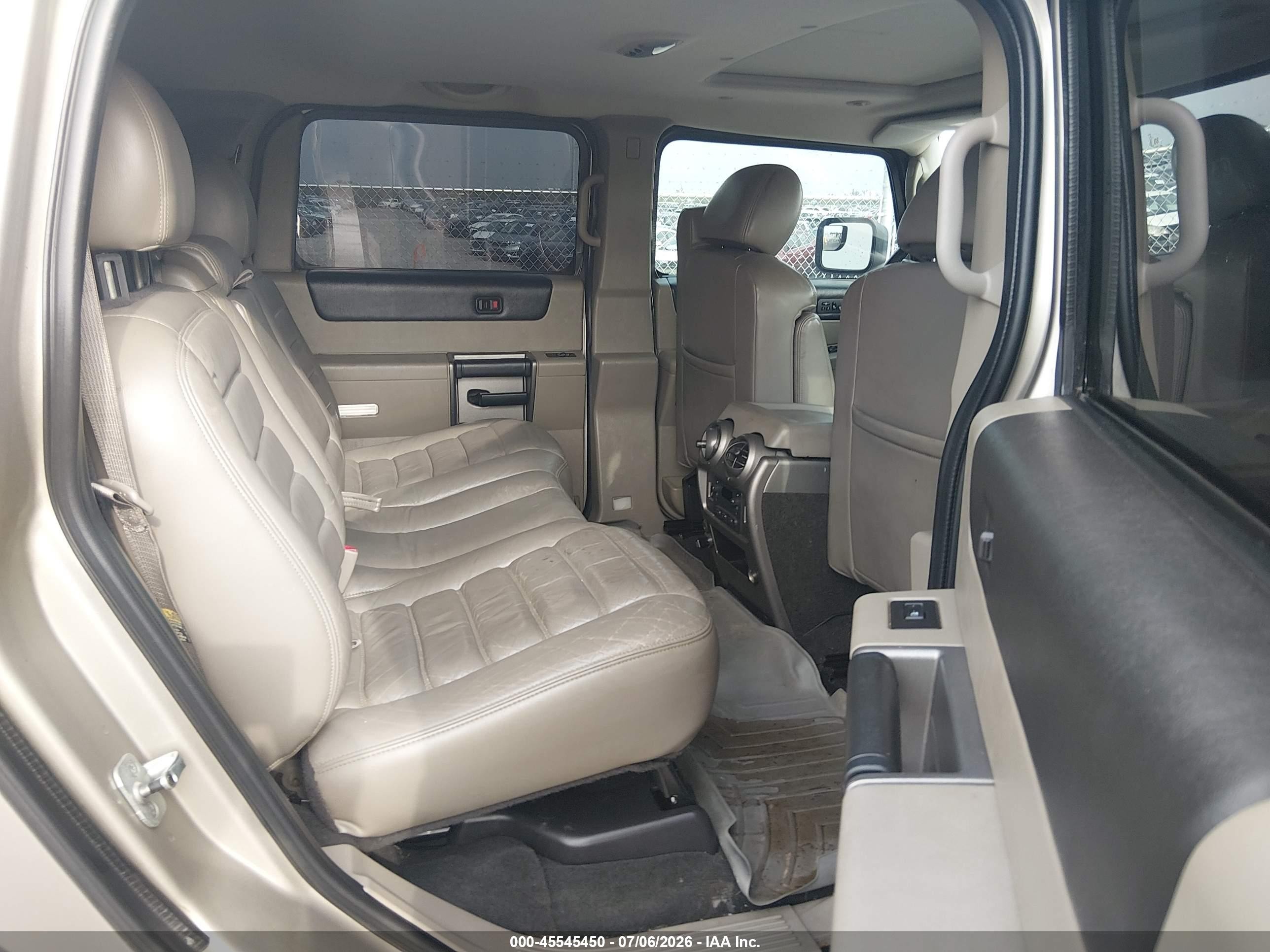 2004 Hummer H2   Champagne vin: 5GRGN23UX4H105774