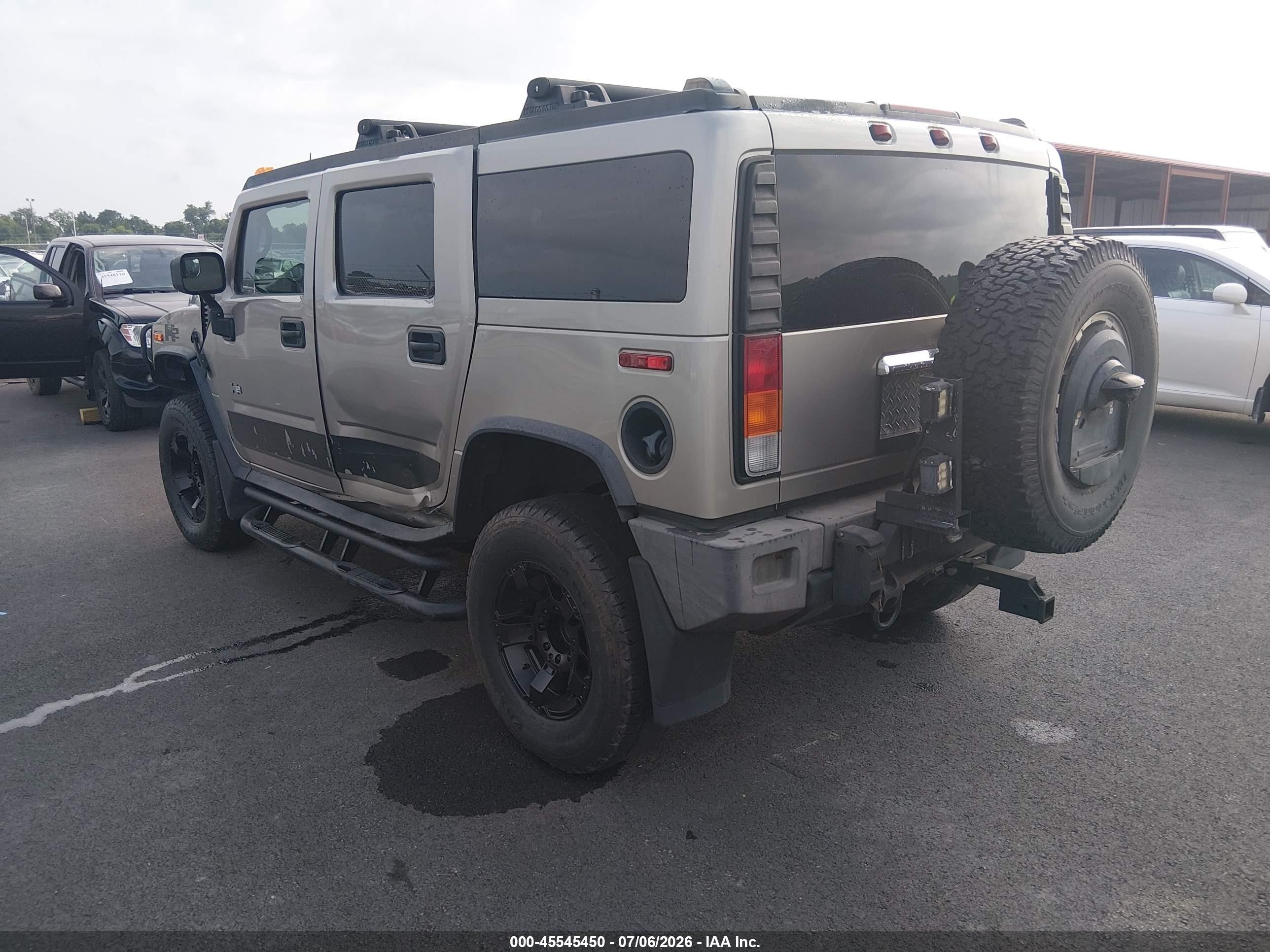 2004 Hummer H2   Champagne vin: 5GRGN23UX4H105774