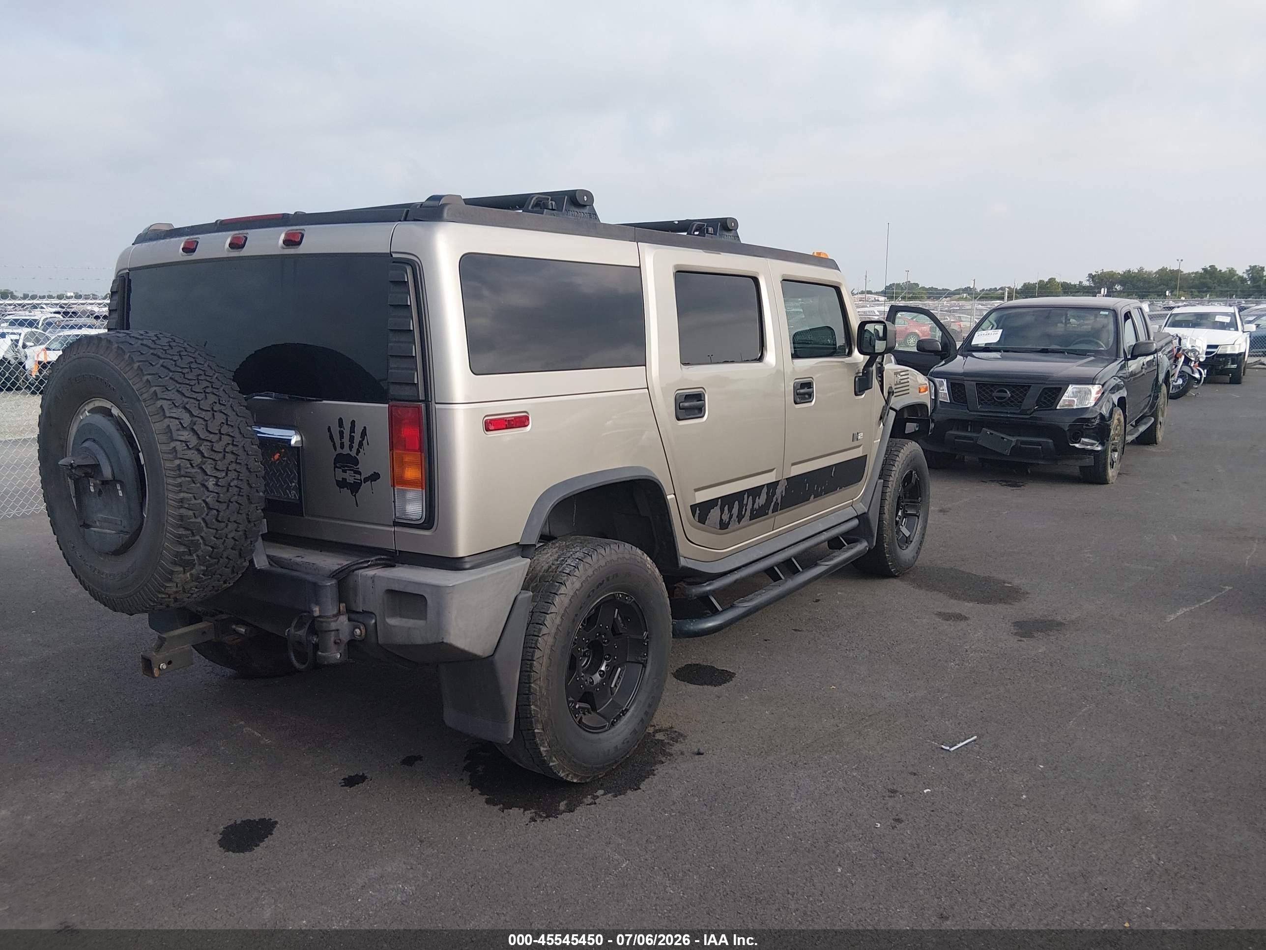 2004 Hummer H2   Champagne vin: 5GRGN23UX4H105774