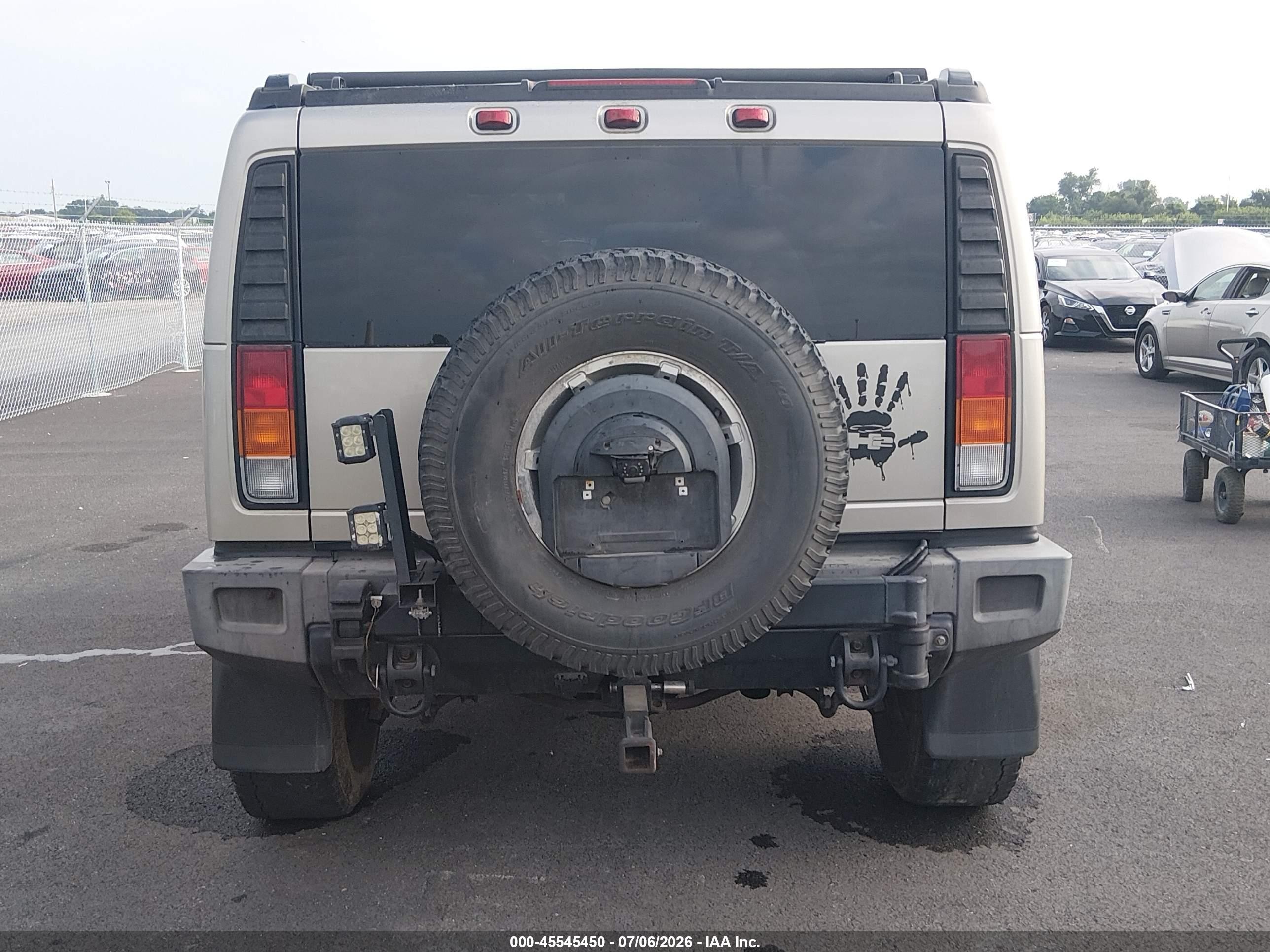 2004 Hummer H2   Champagne vin: 5GRGN23UX4H105774