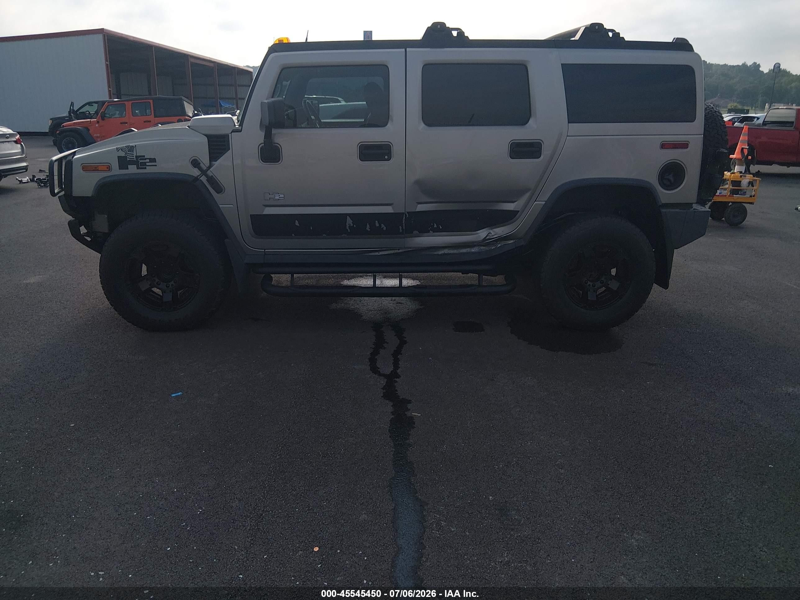 2004 Hummer H2   Champagne vin: 5GRGN23UX4H105774