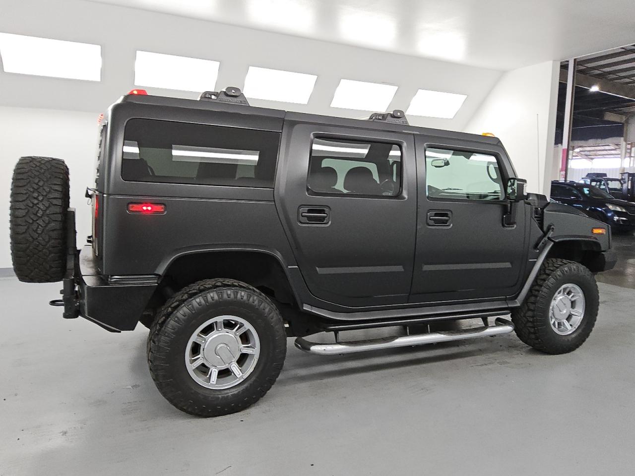 2006 Hummer H2 Black vin: 5GRGN23UX6H102182
