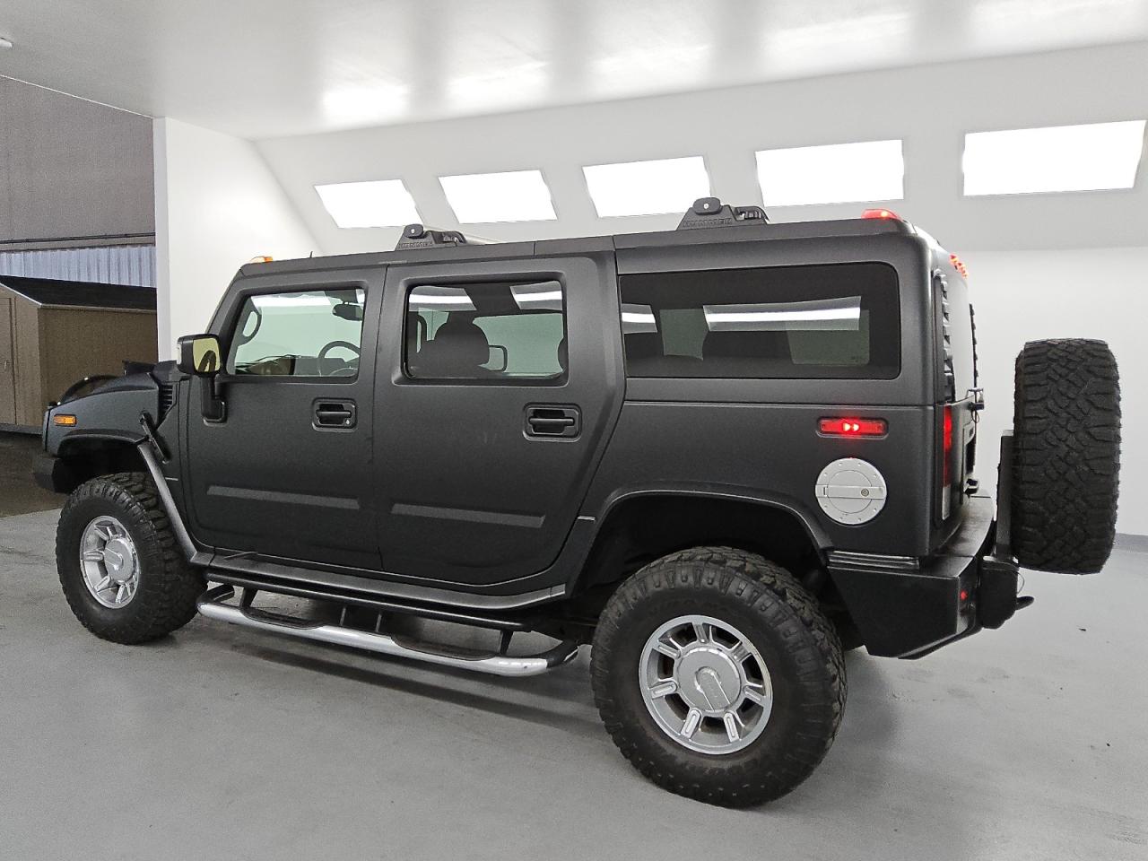 2006 Hummer H2 Black vin: 5GRGN23UX6H102182