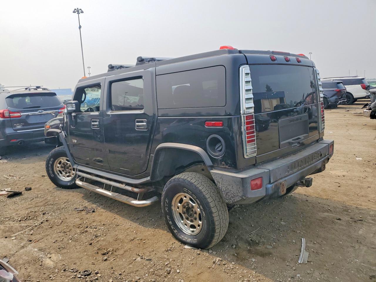 2006 Hummer H2 Black vin: 5GRGN23UX6H122495