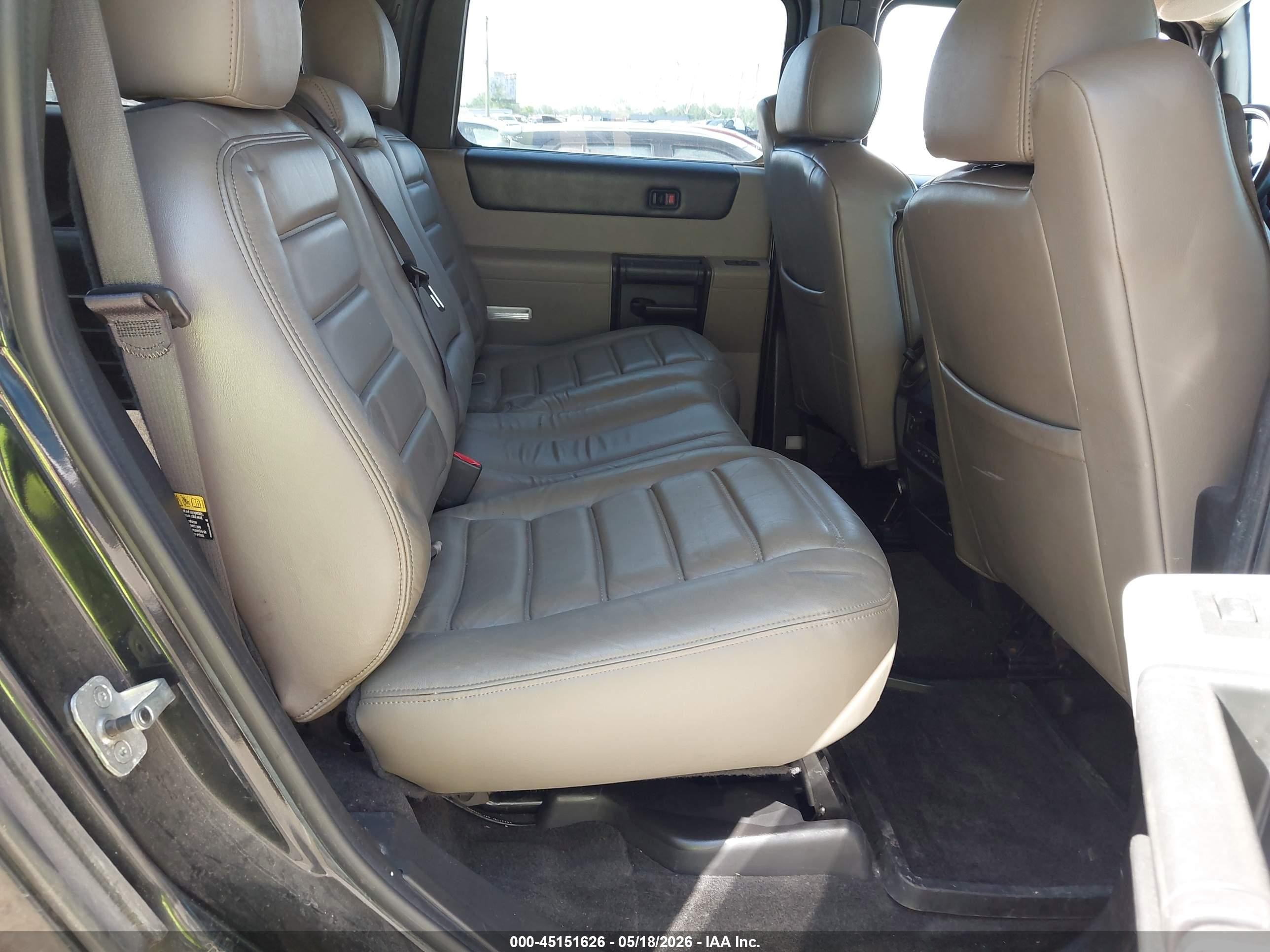 2007 Hummer H2 Suv   Black vin: 5GRGN23UX7H100305