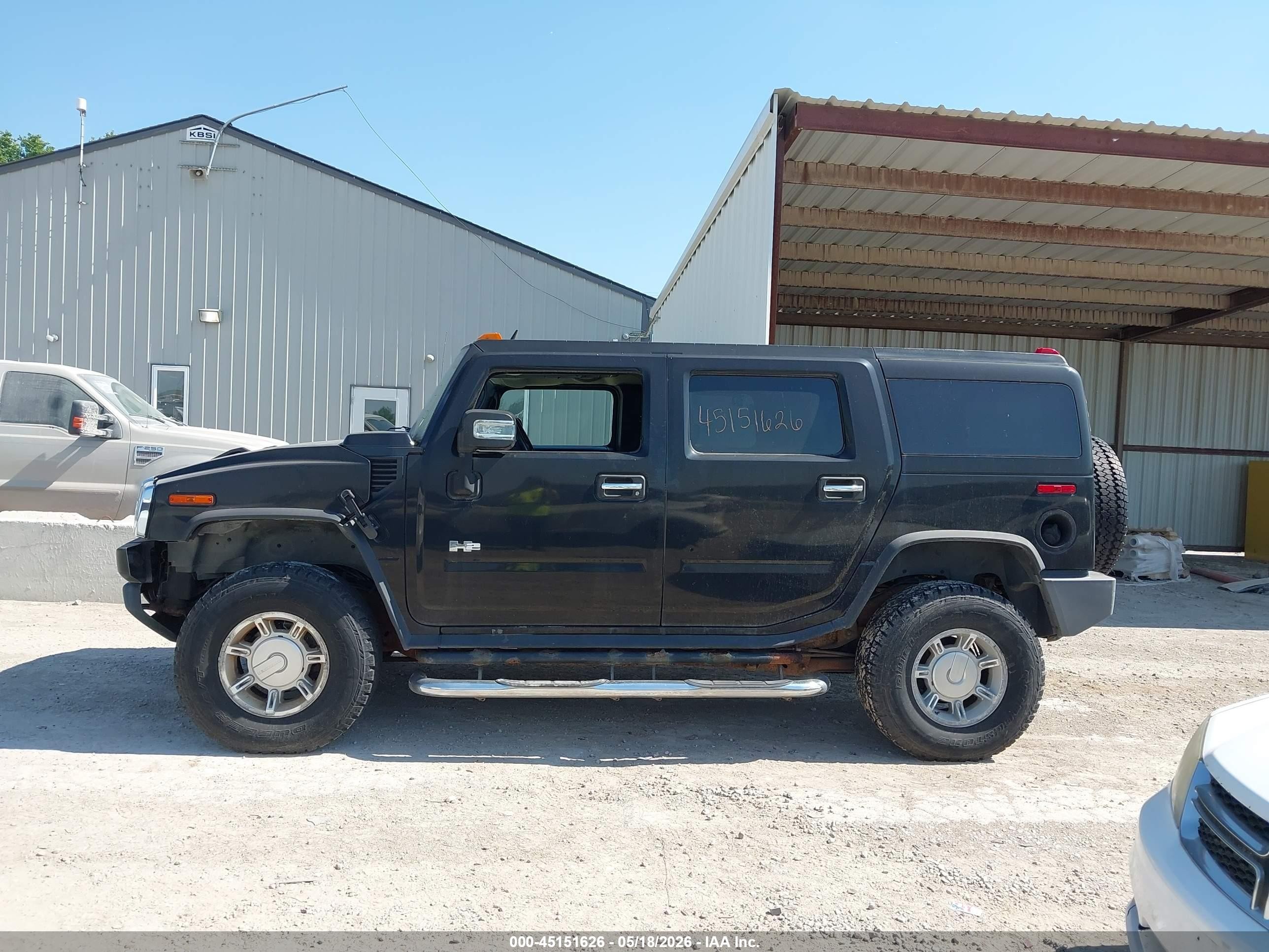 2007 Hummer H2 Suv   Black vin: 5GRGN23UX7H100305