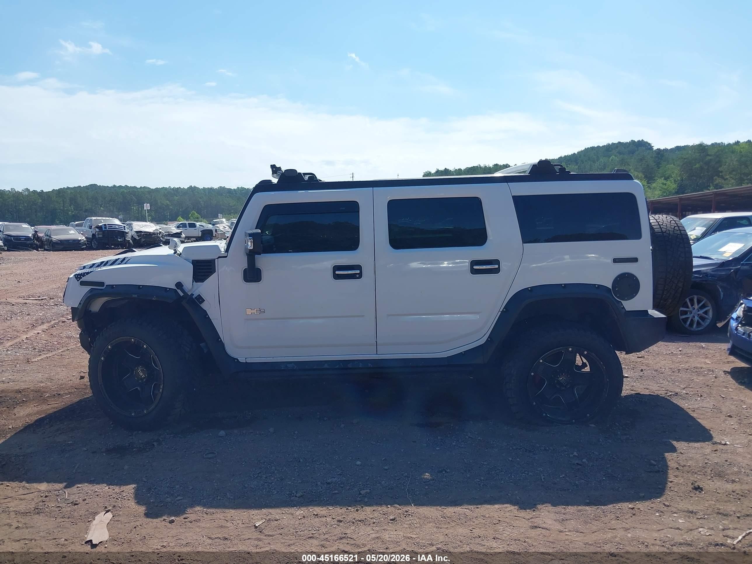 2007 Hummer H2 Suv   White vin: 5GRGN23UX7H110428