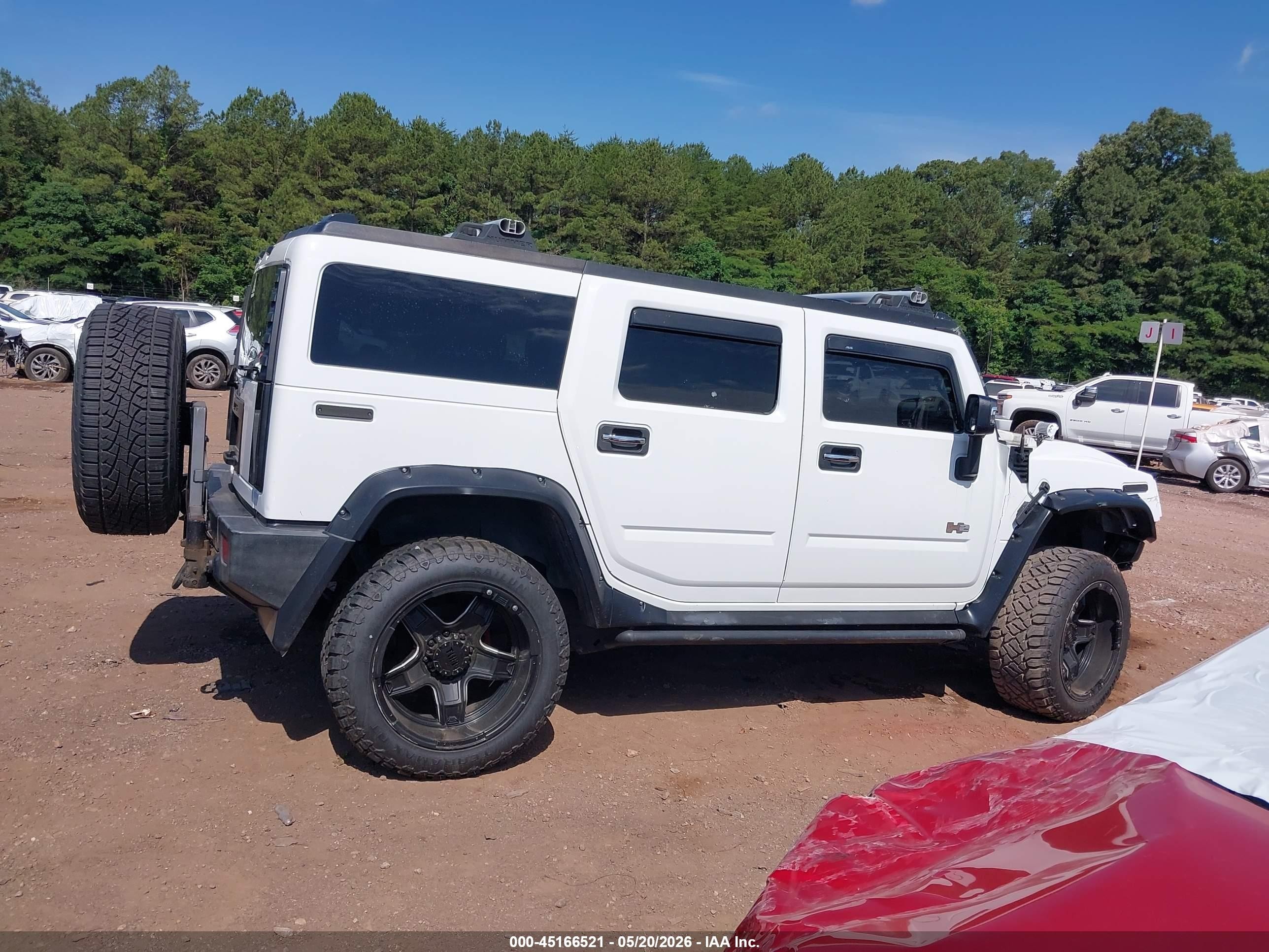 2007 Hummer H2 Suv   White vin: 5GRGN23UX7H110428
