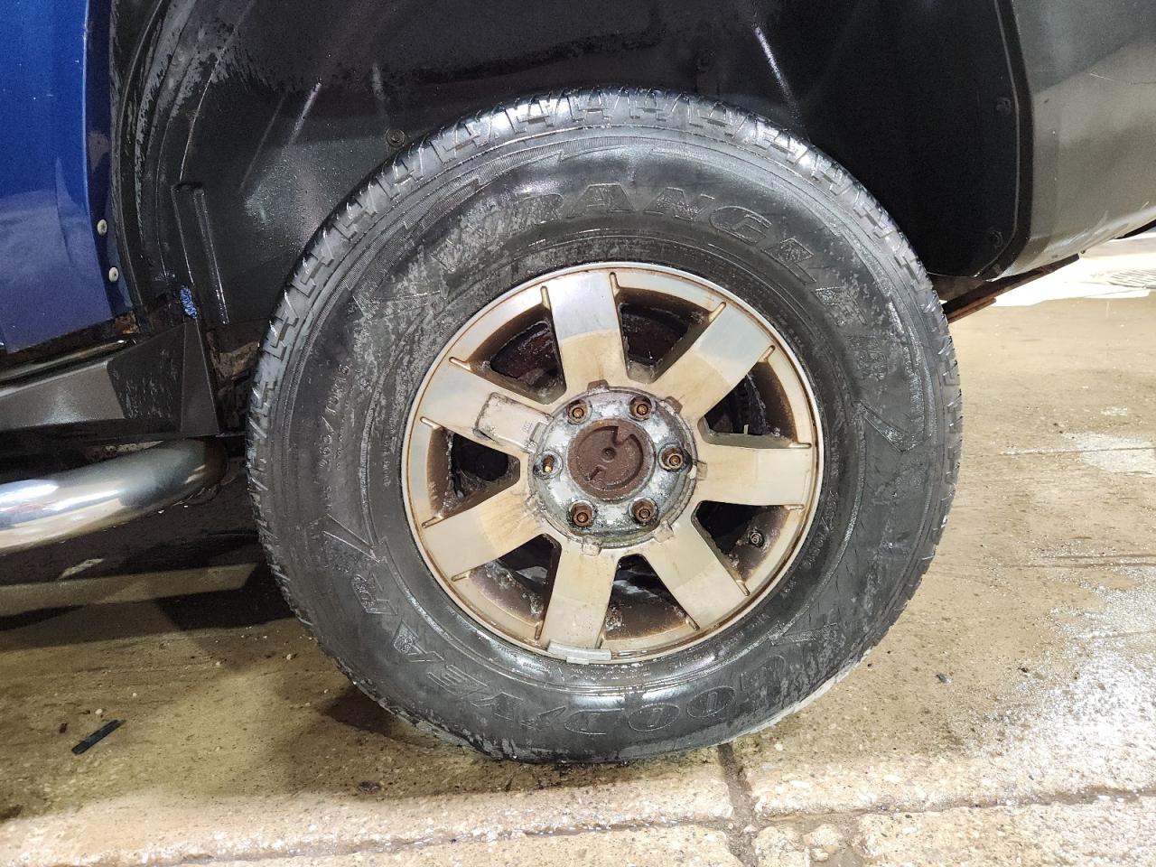 2006 Hummer H3 Blue vin: 5GTDN136668149492 Damage: Left Rear Wheel, Corrosion, > 12 Inches