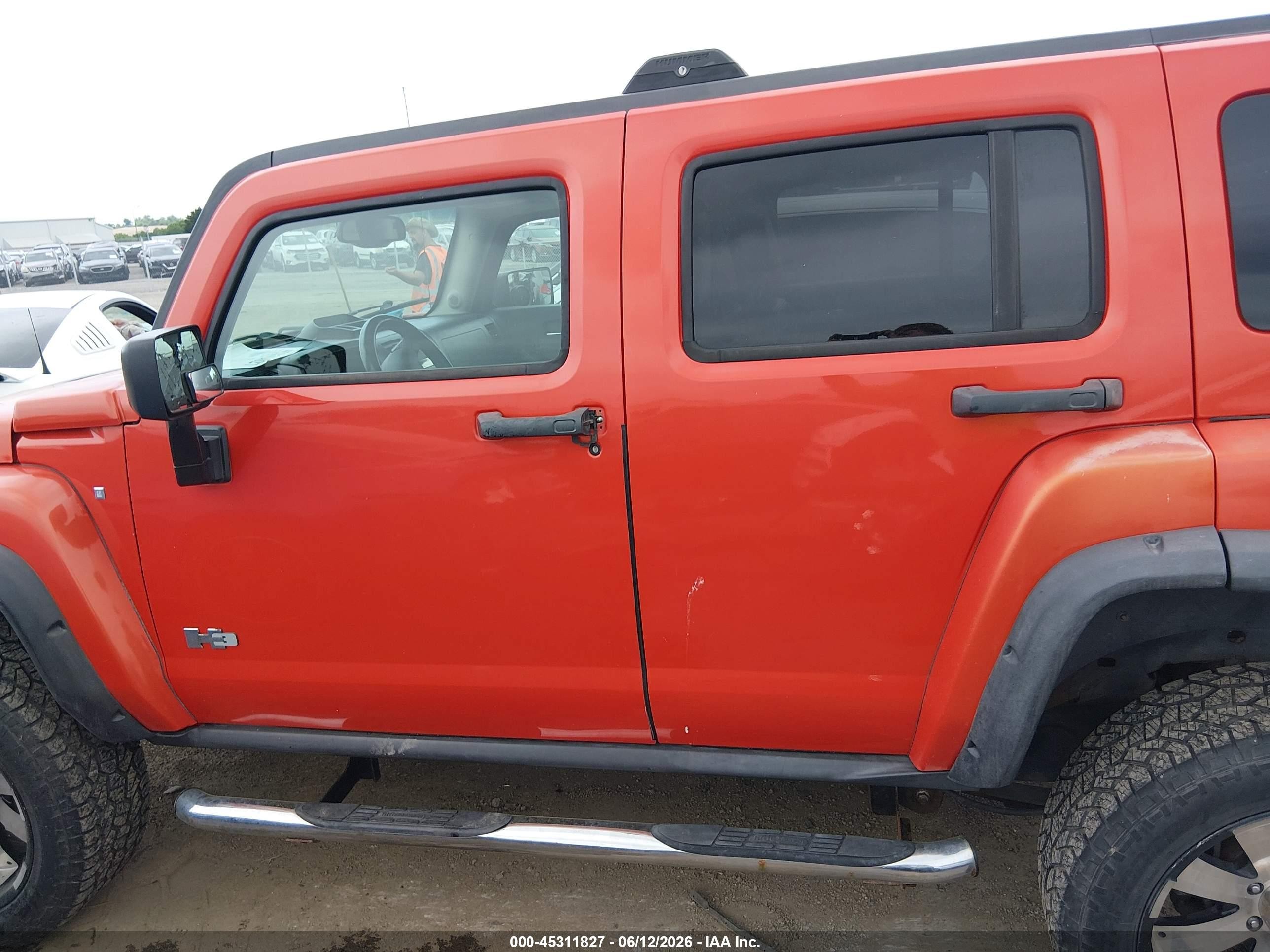 2009 Hummer H3 Suv   Orange vin: 5GTEN13E498139981