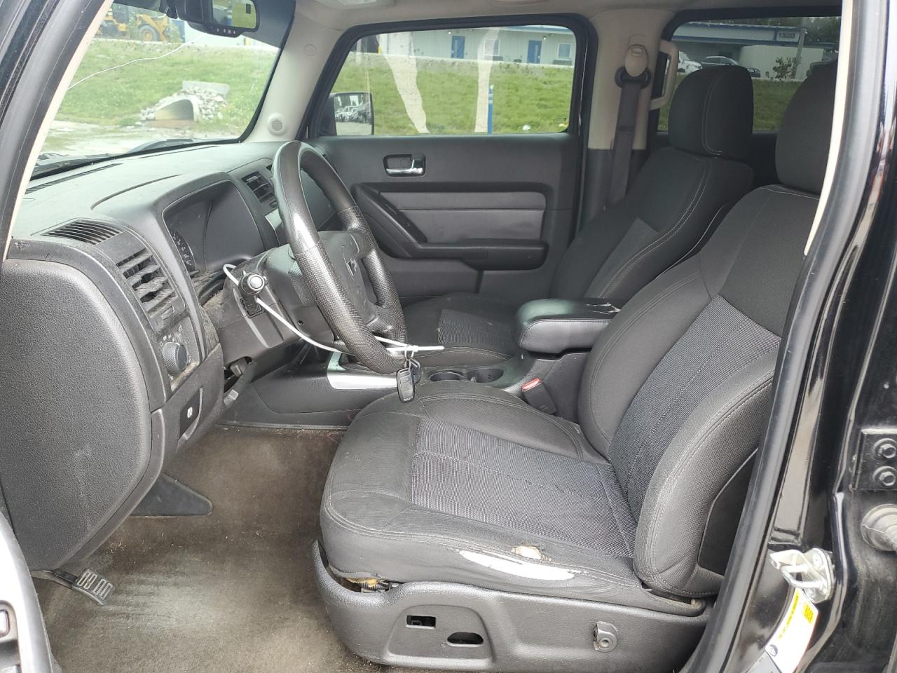 2010 Hummer H3 Black vin: 5GTMNGEE1A8137654 Damage: Left Front Seat Cushion, Torn, 6 To 7 Inches