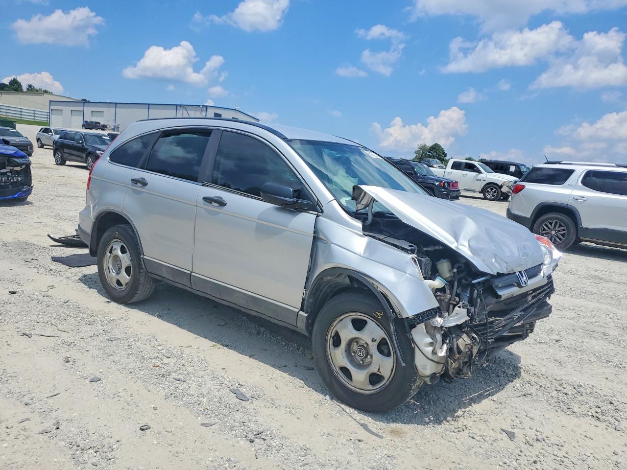 2009 Honda Cr-v Lx Серый vin: 5J6RE38329L028574