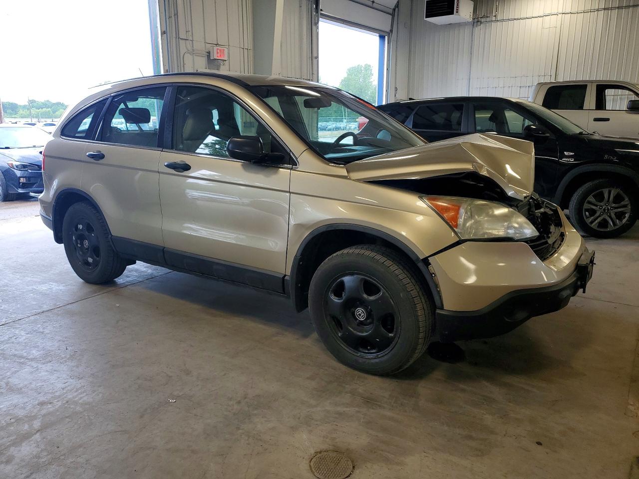 2009 Honda Cr-v Lx Tan vin: 5J6RE48339L014253