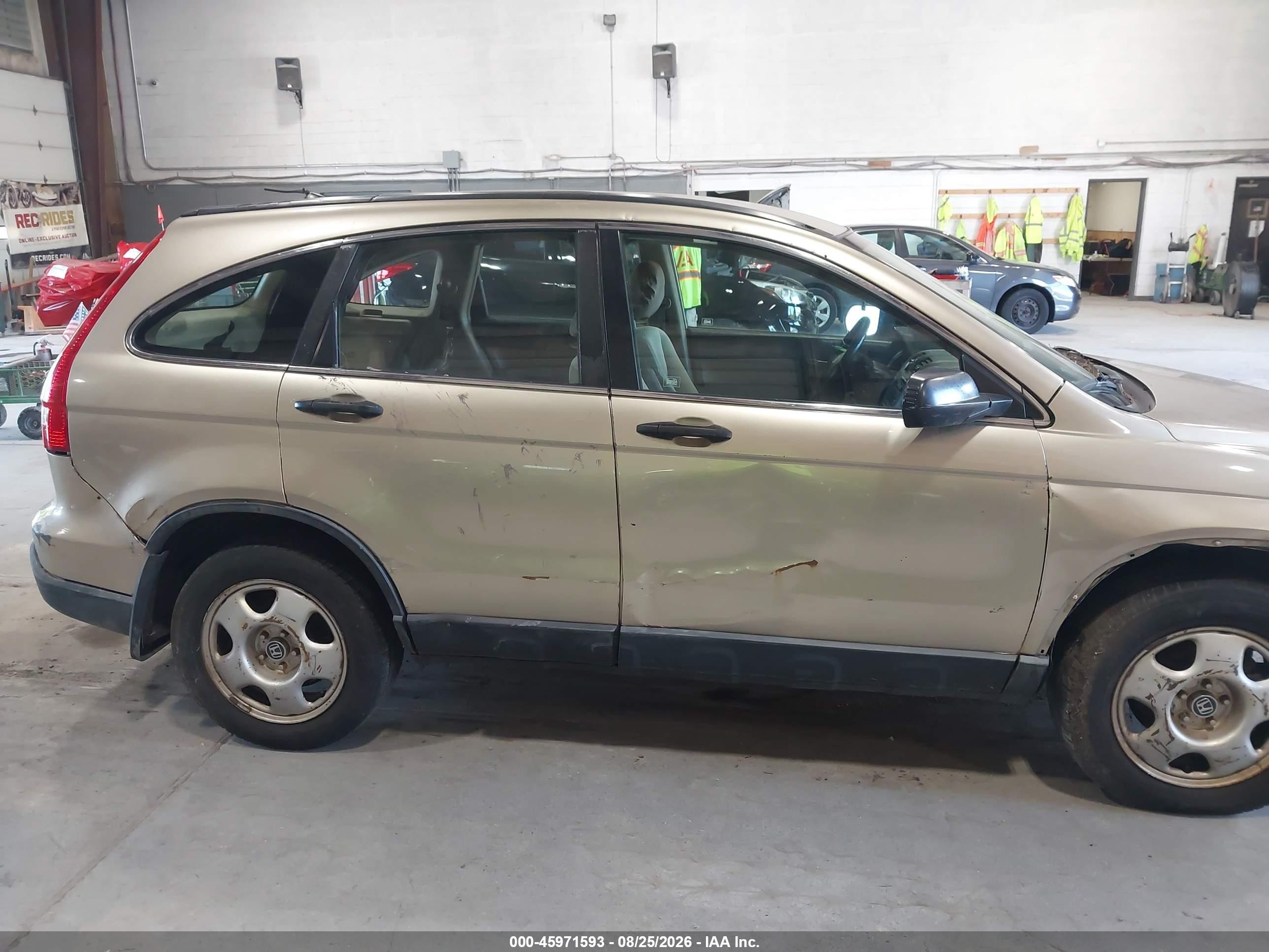 2009 Honda Cr-v Lx Gold vin: 5J6RE483X9L058394