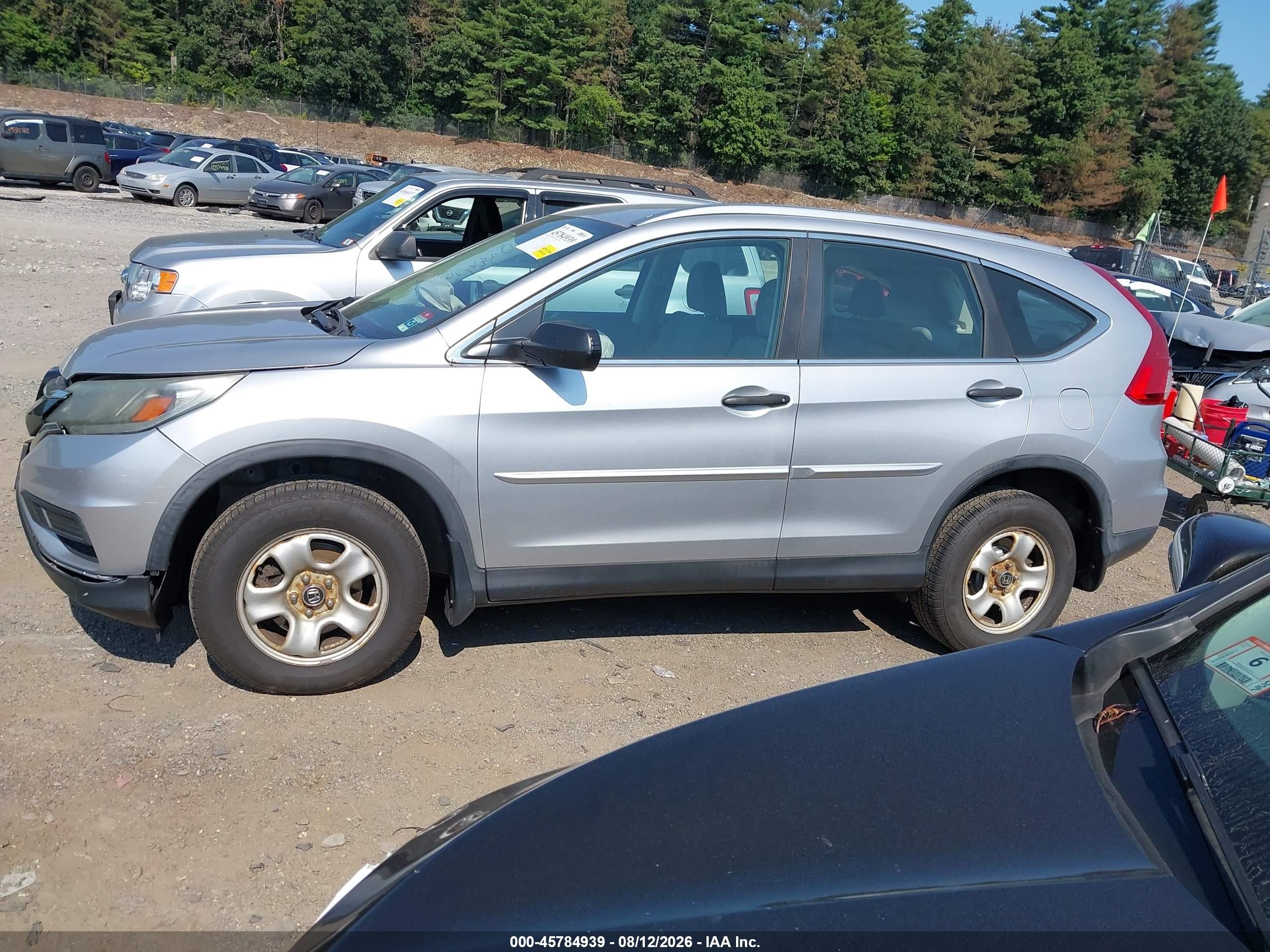 2015 Honda Cr-v Lx Silver vin: 5J6RM4H3XFL022154