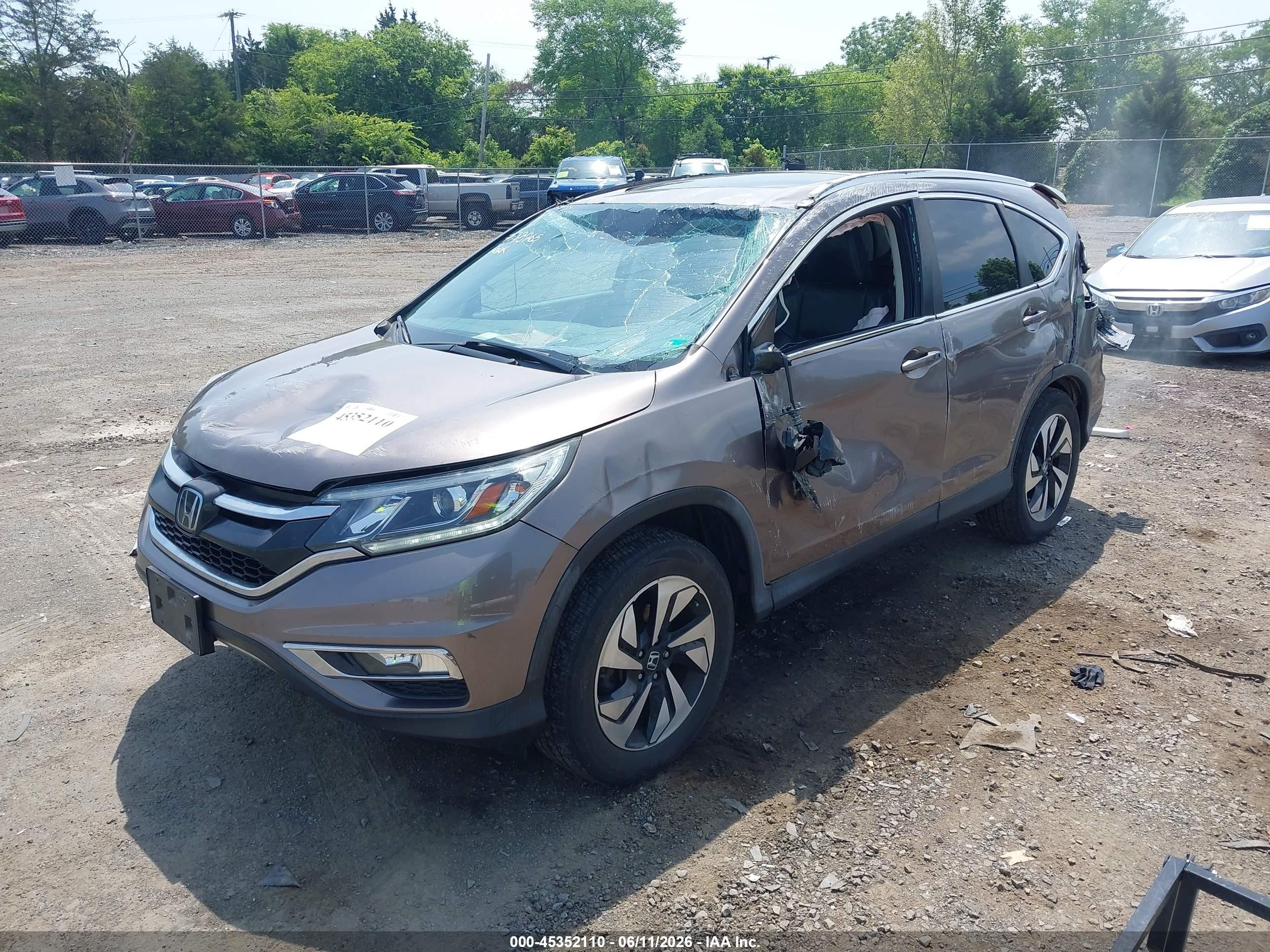 2015 Honda Cr-v Touring Коричневый vin: 5J6RM4H92FL090159