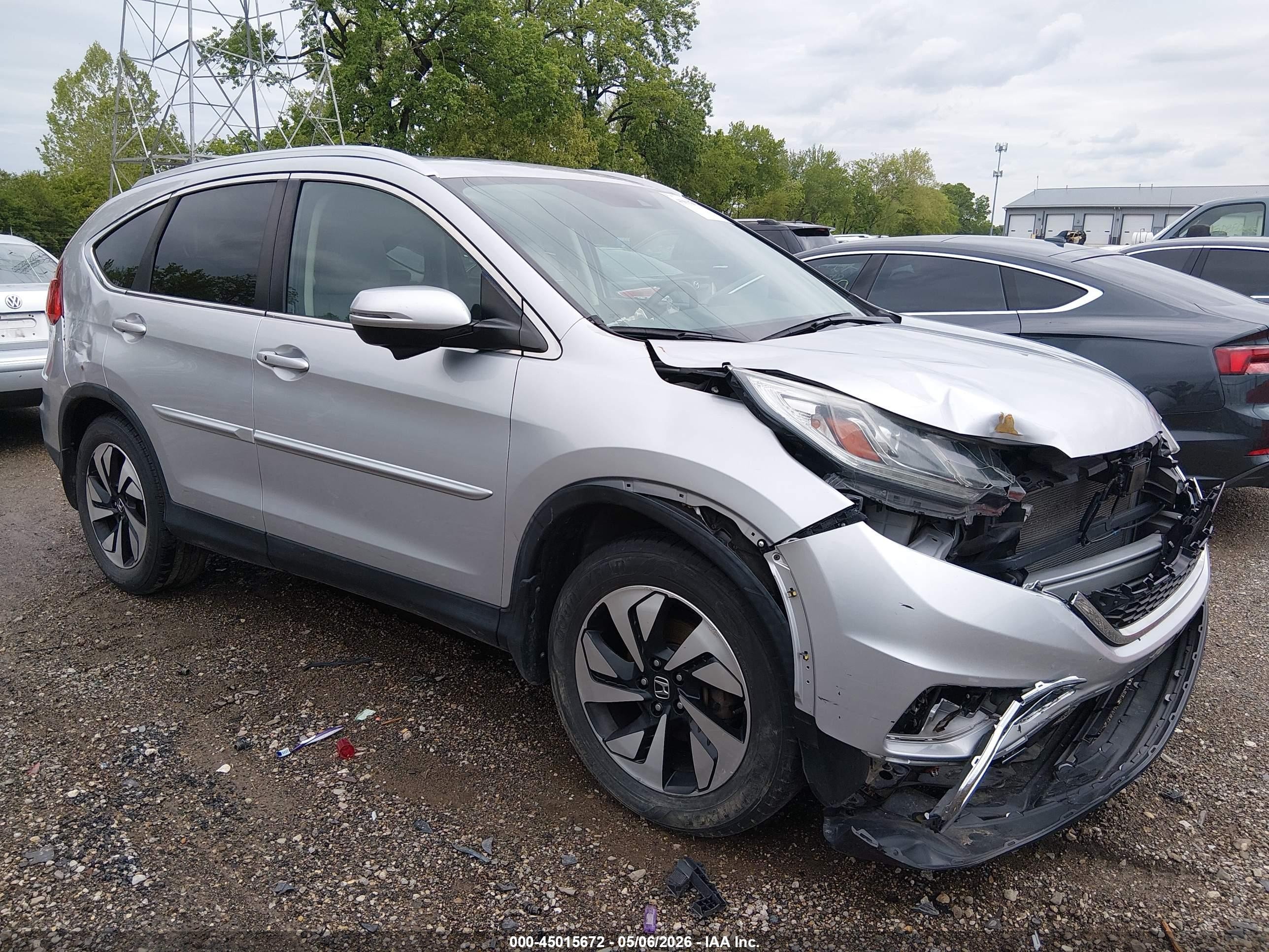 2016 Honda Cr-v Touring Серебряный vin: 5J6RM4H9XGL004405