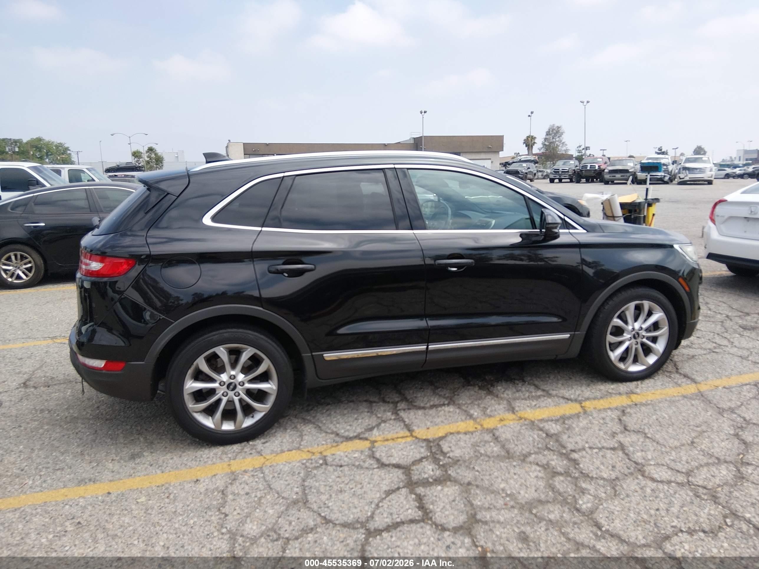 2015 Lincoln Mkc   Black vin: 5LMCJ1A90FUJ03099