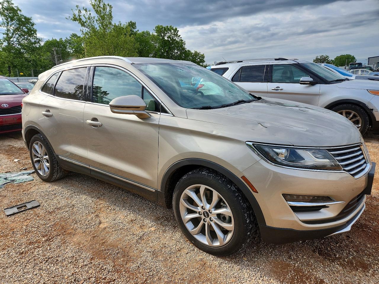 2015 Lincoln Mkc Tan vin: 5LMCJ1A97FUJ11166