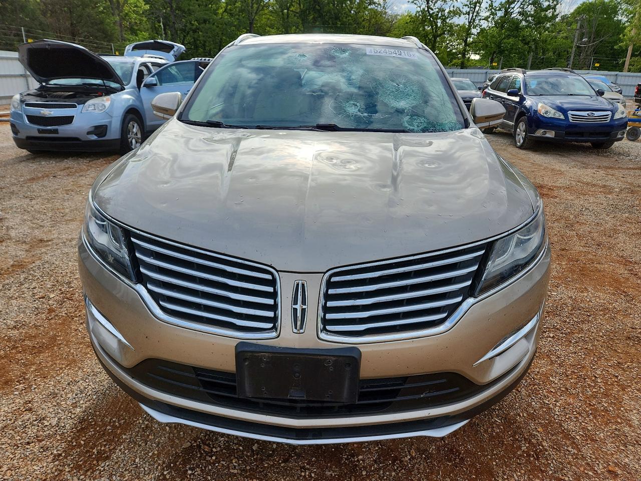 2015 Lincoln Mkc Tan vin: 5LMCJ1A97FUJ11166