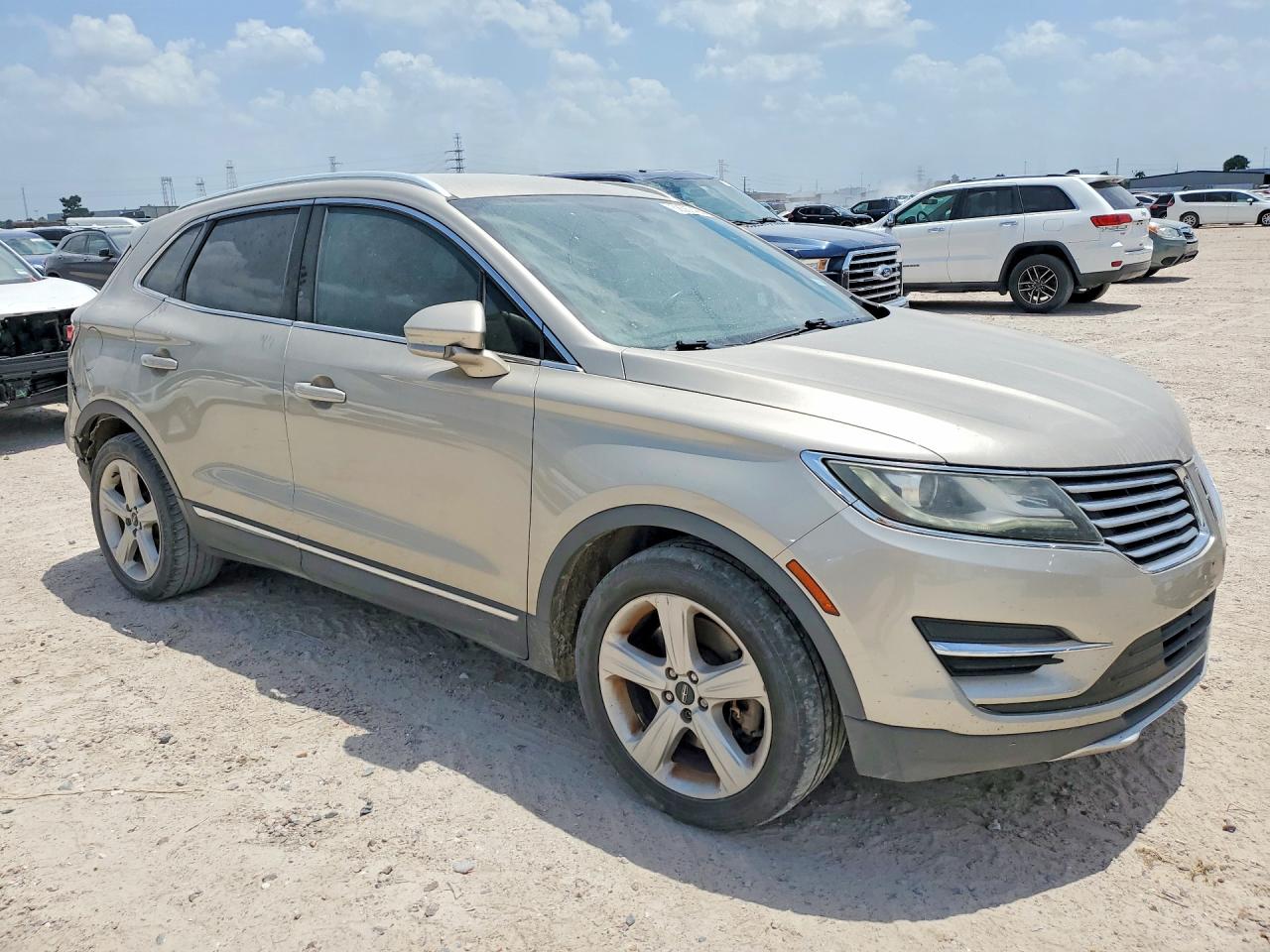 2015 Lincoln Mkc Gold vin: 5LMCJ1A99FUJ31676