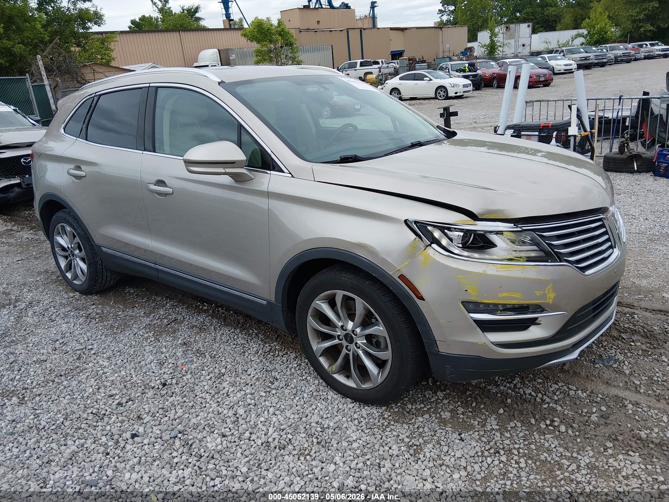 2015 Lincoln Mkc Beige vin: 5LMCJ1A9XFUJ05426