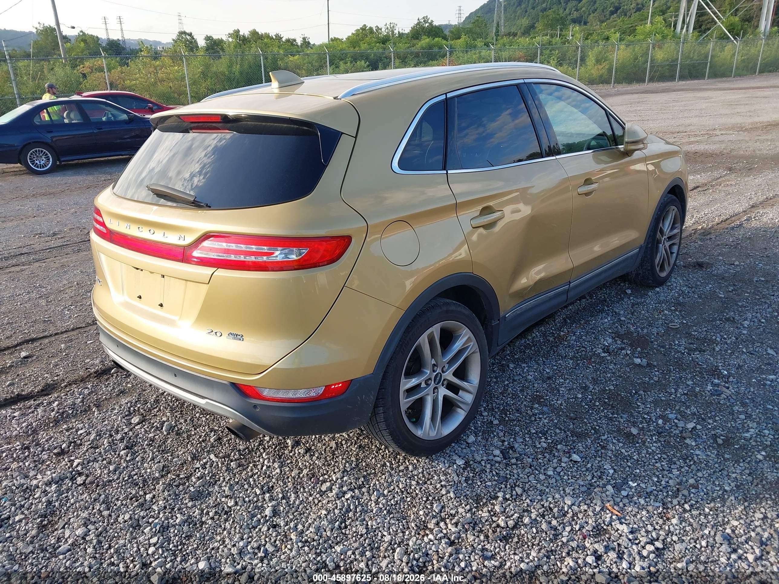 2015 Lincoln Mkc Gold vin: 5LMCJ2A99FUJ03480