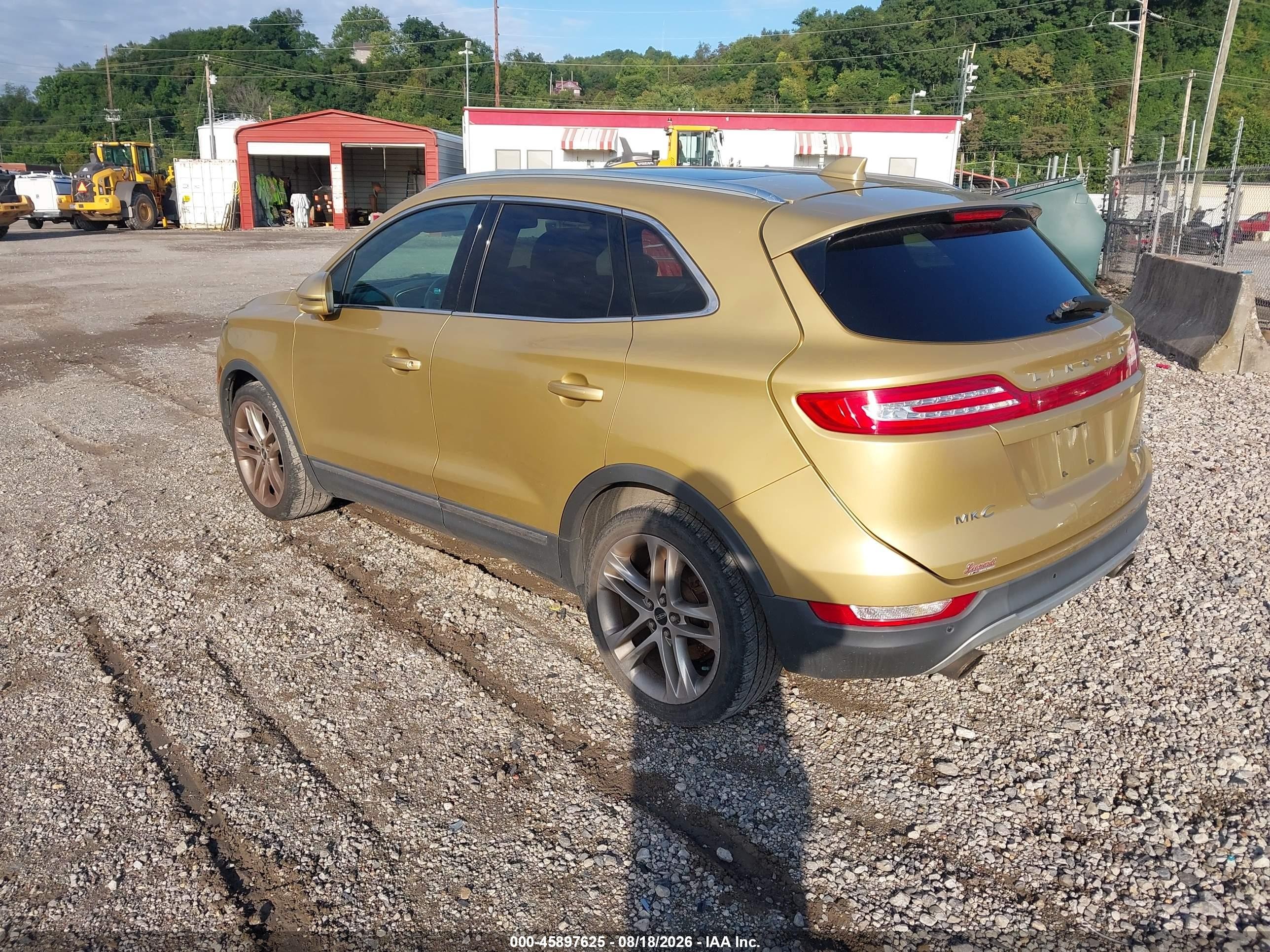 2015 Lincoln Mkc Gold vin: 5LMCJ2A99FUJ03480