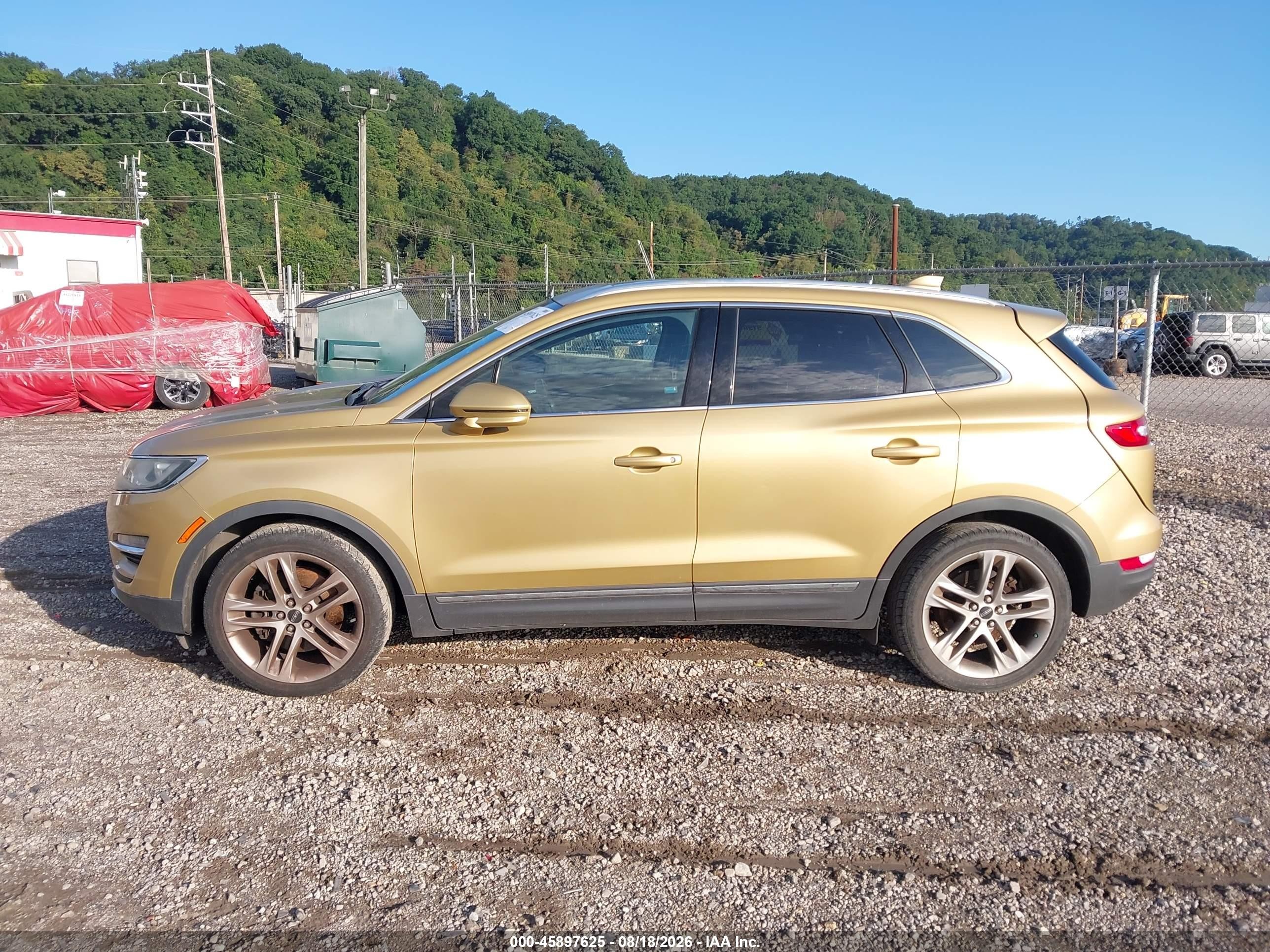 2015 Lincoln Mkc Gold vin: 5LMCJ2A99FUJ03480