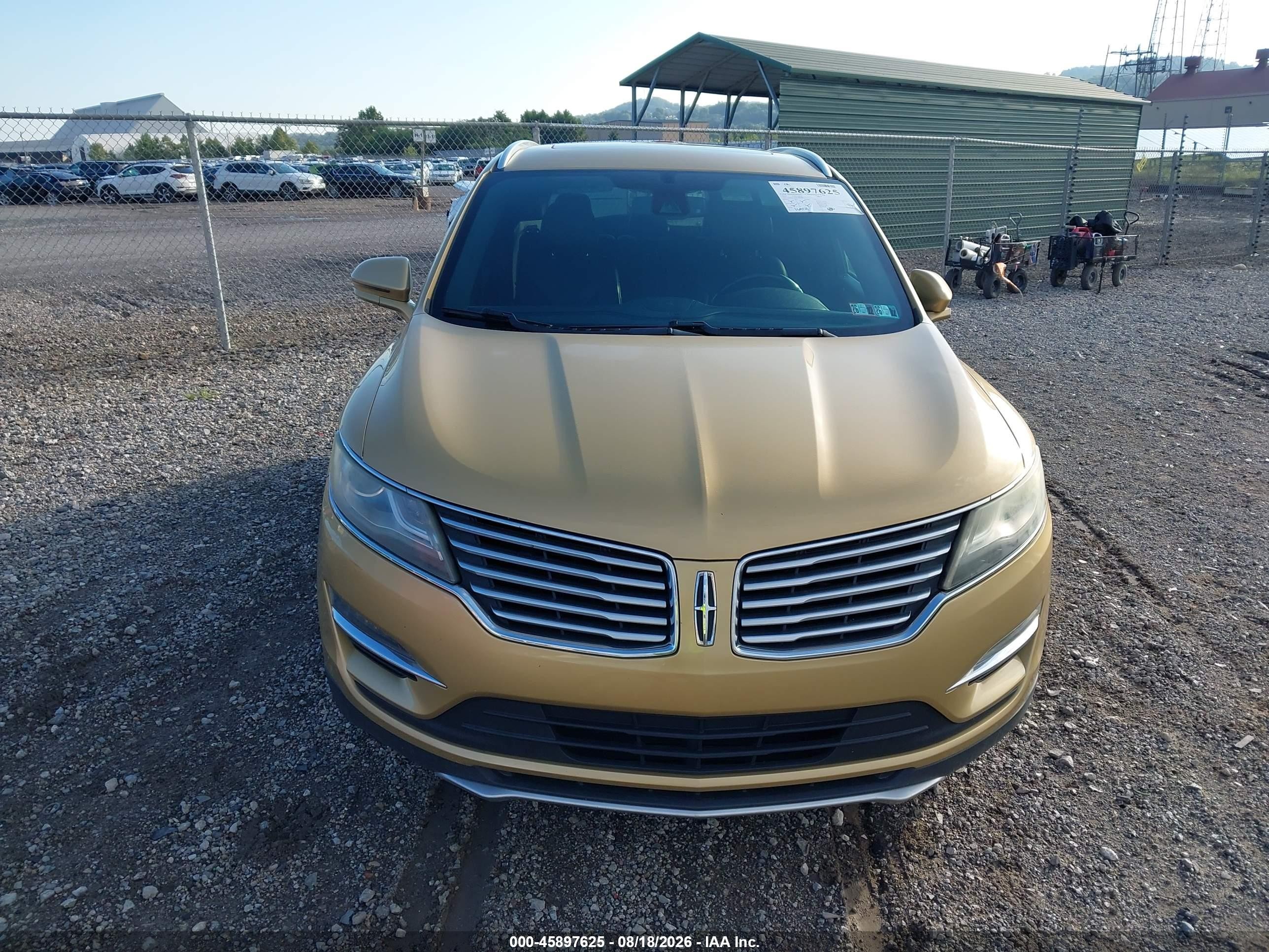 2015 Lincoln Mkc Gold vin: 5LMCJ2A99FUJ03480
