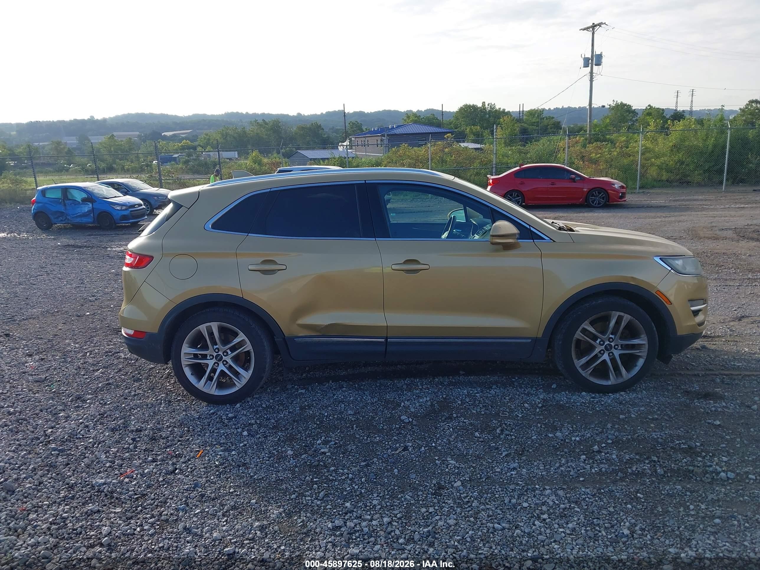 2015 Lincoln Mkc Gold vin: 5LMCJ2A99FUJ03480