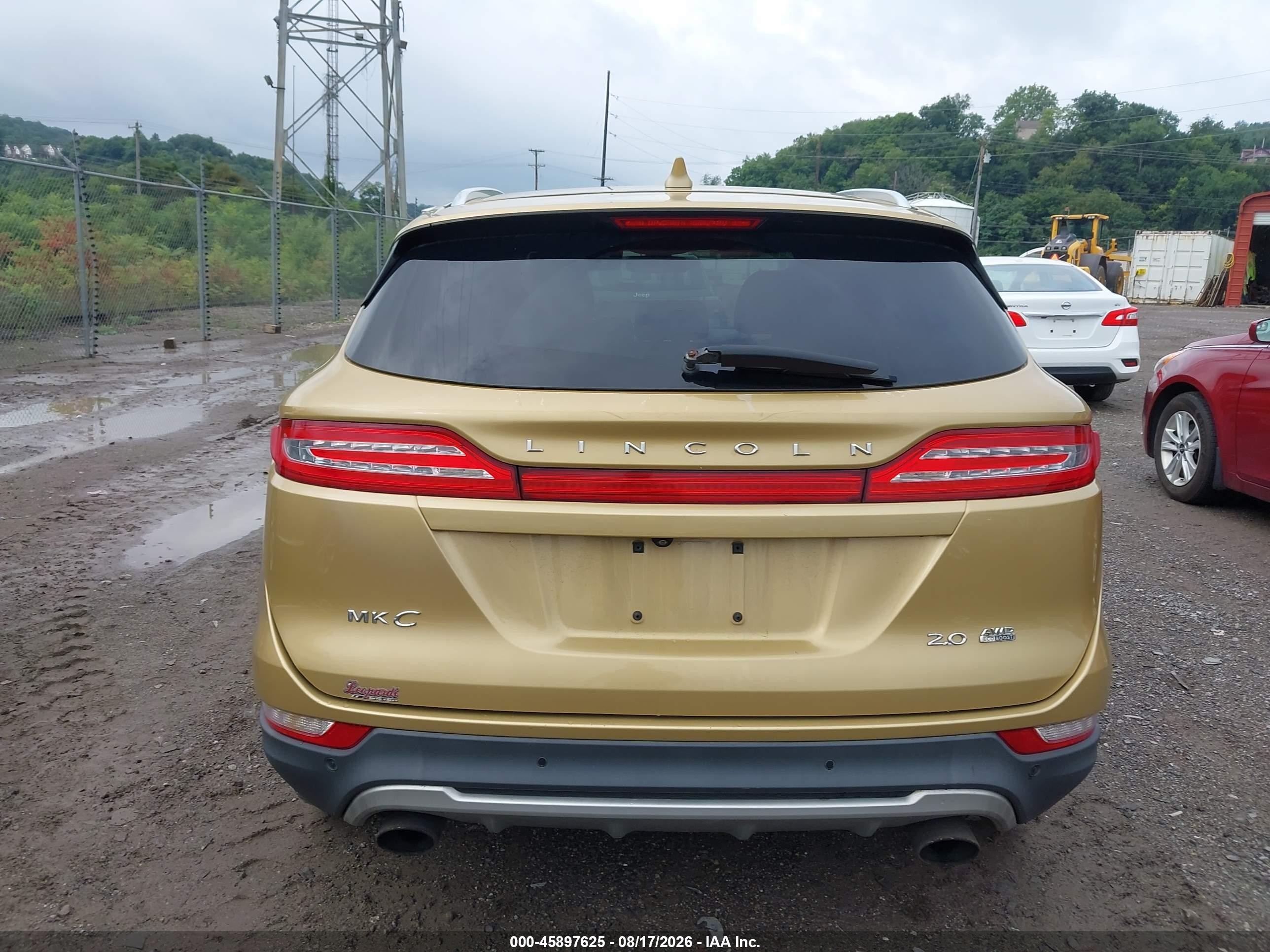 2015 Lincoln Mkc Gold vin: 5LMCJ2A99FUJ03480