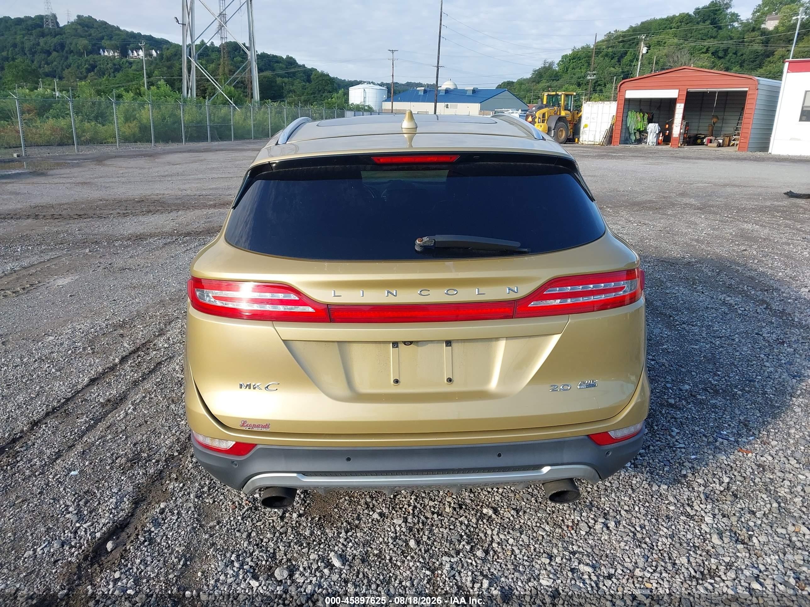 2015 Lincoln Mkc Gold vin: 5LMCJ2A99FUJ03480