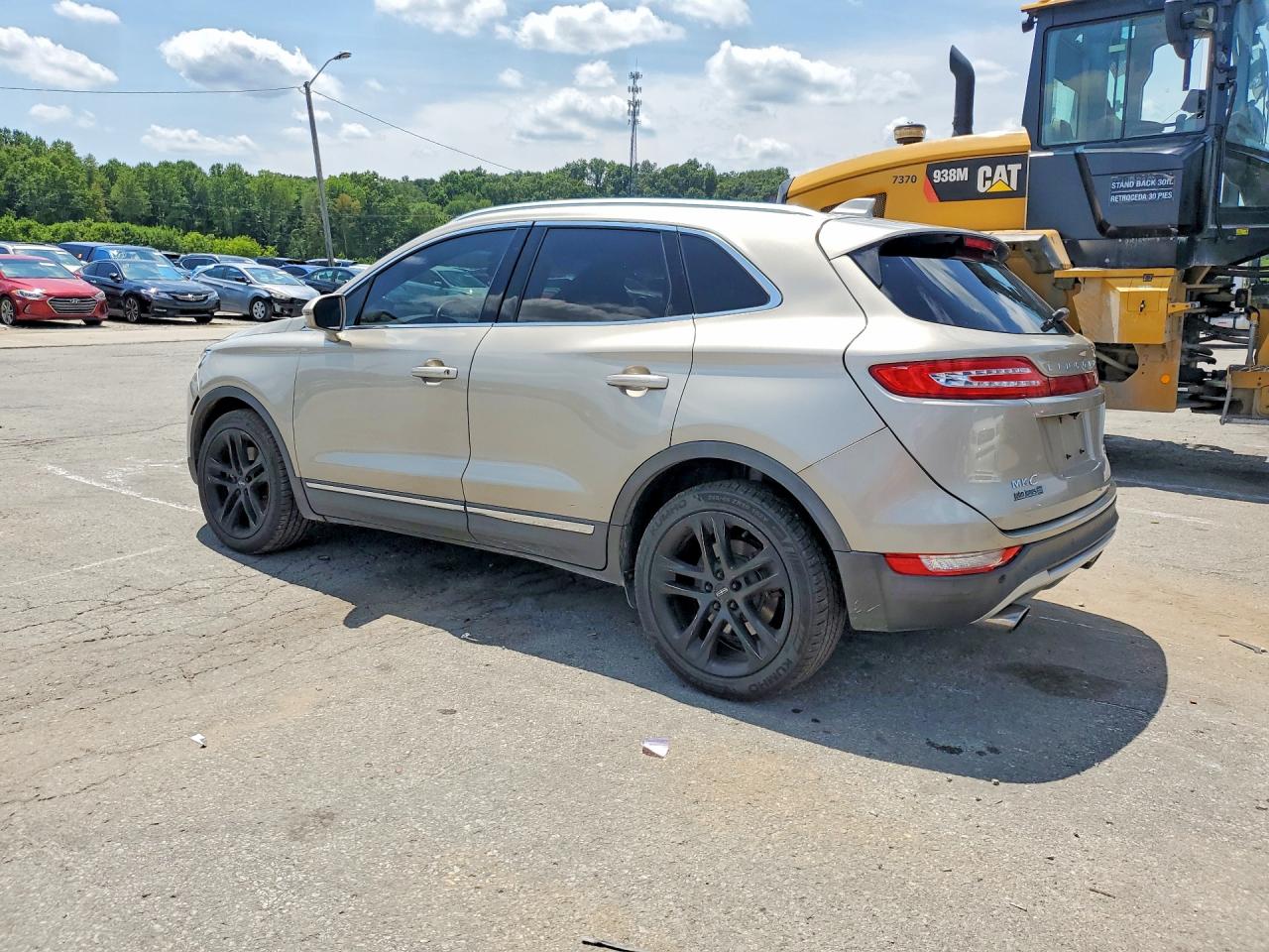 2015 Lincoln Mkc Beige vin: 5LMCJ2A99FUJ46829