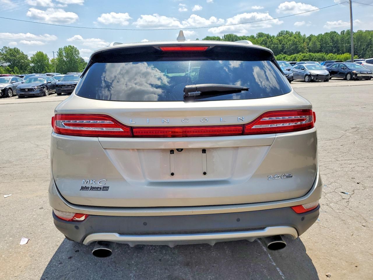 2015 Lincoln Mkc Beige vin: 5LMCJ2A99FUJ46829