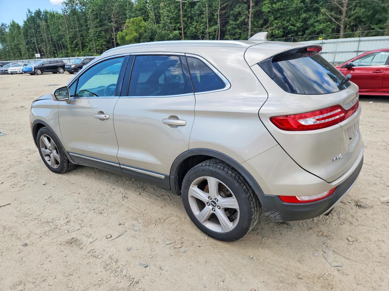 2015 Lincoln Mkc Gold vin: 5LMCJ2A9XFUJ04377