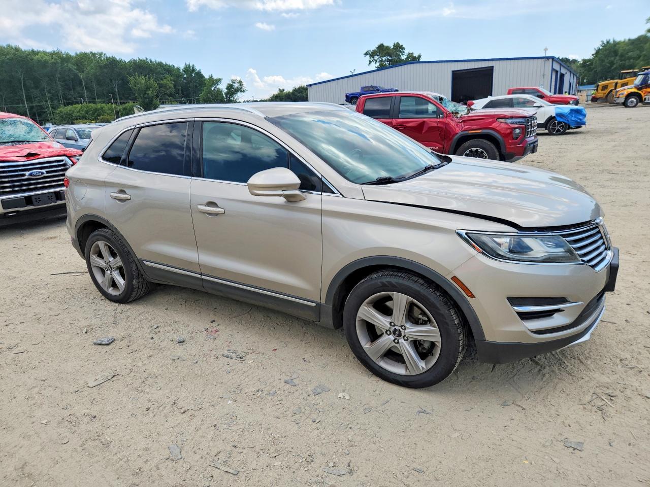 2015 Lincoln Mkc Gold vin: 5LMCJ2A9XFUJ04377