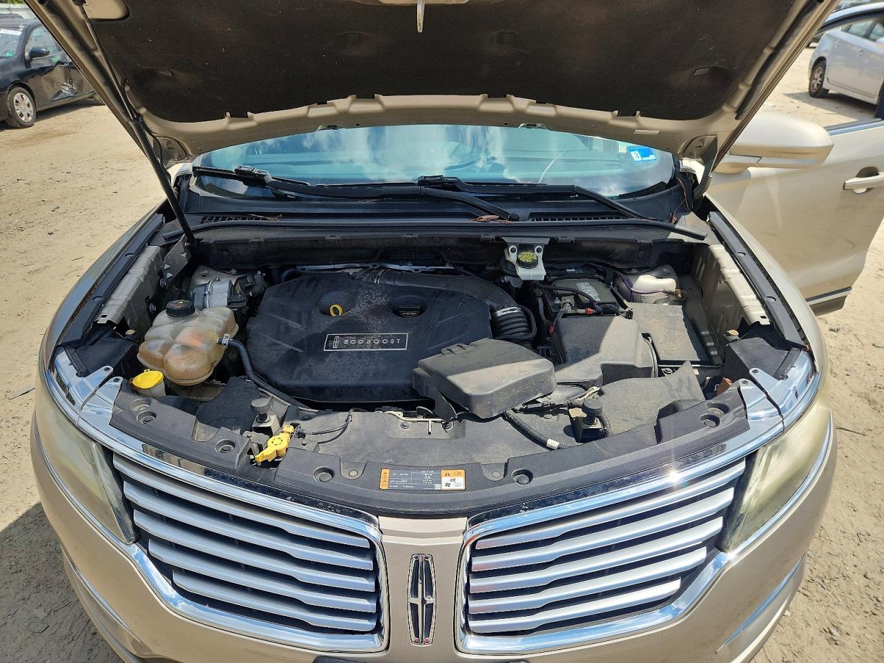 2015 Lincoln Mkc Gold vin: 5LMCJ2A9XFUJ04377