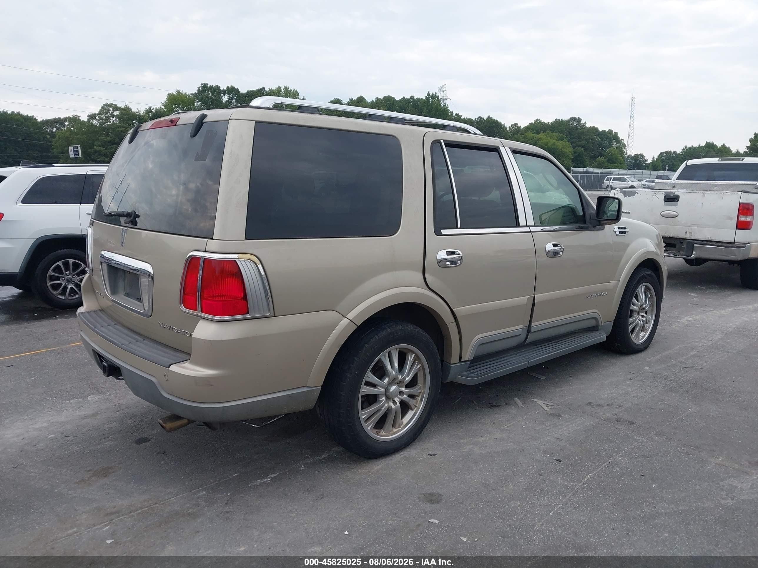2004 Lincoln Navigator   Gold vin: 5LMFU27R04LJ04953