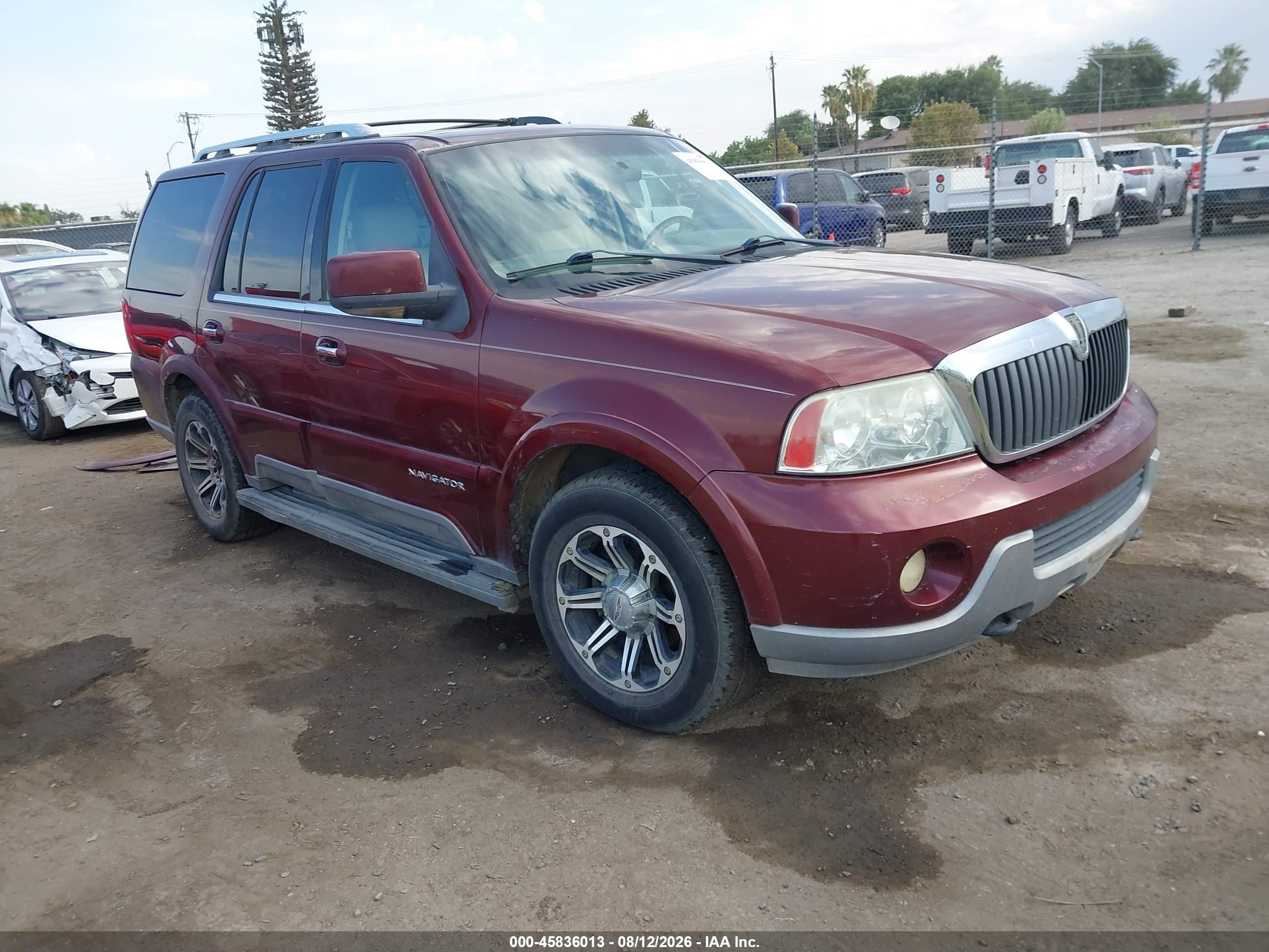2003 Lincoln Navigator   Burgundy vin: 5LMFU27RX3LJ23931