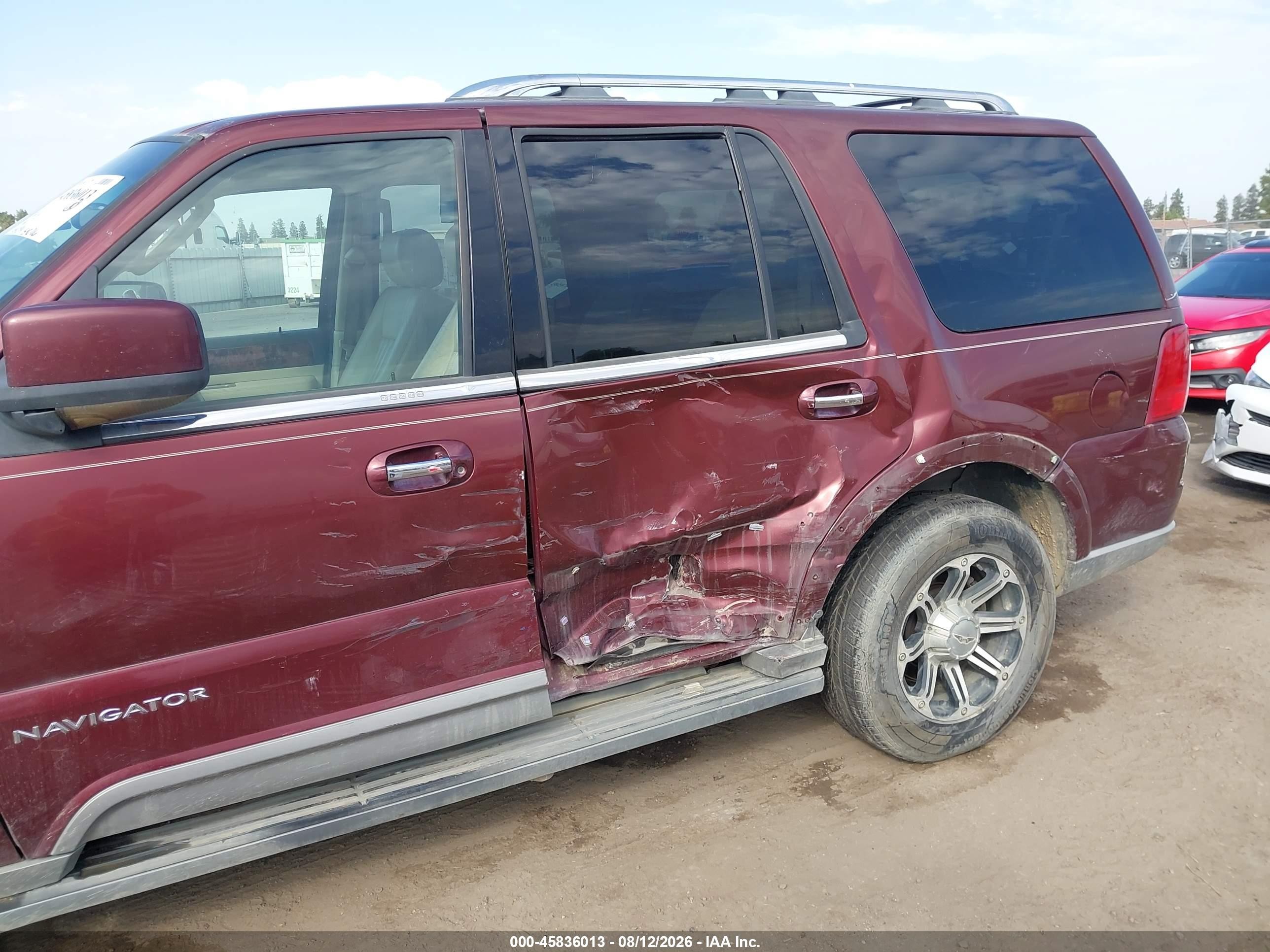 2003 Lincoln Navigator   Burgundy vin: 5LMFU27RX3LJ23931