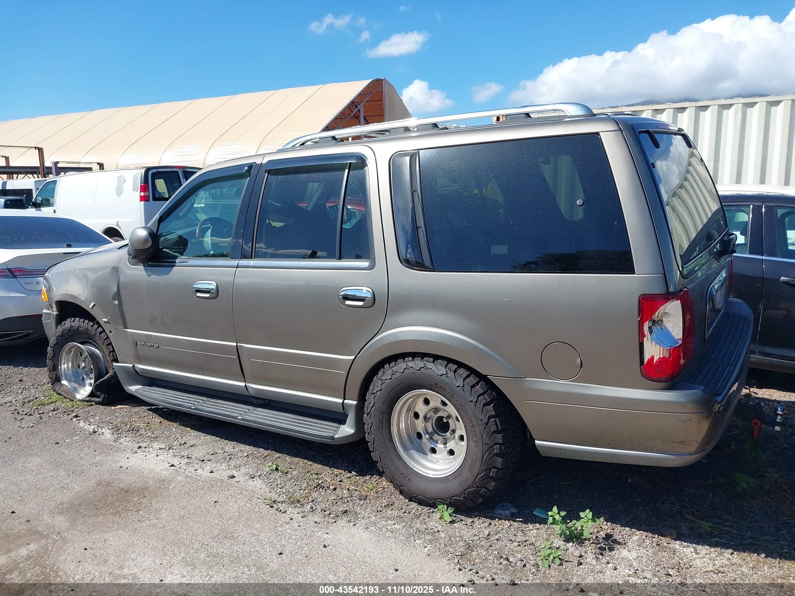 2001 Lincoln Navigator   Tan vin: 5LMFU28A41LJ06337