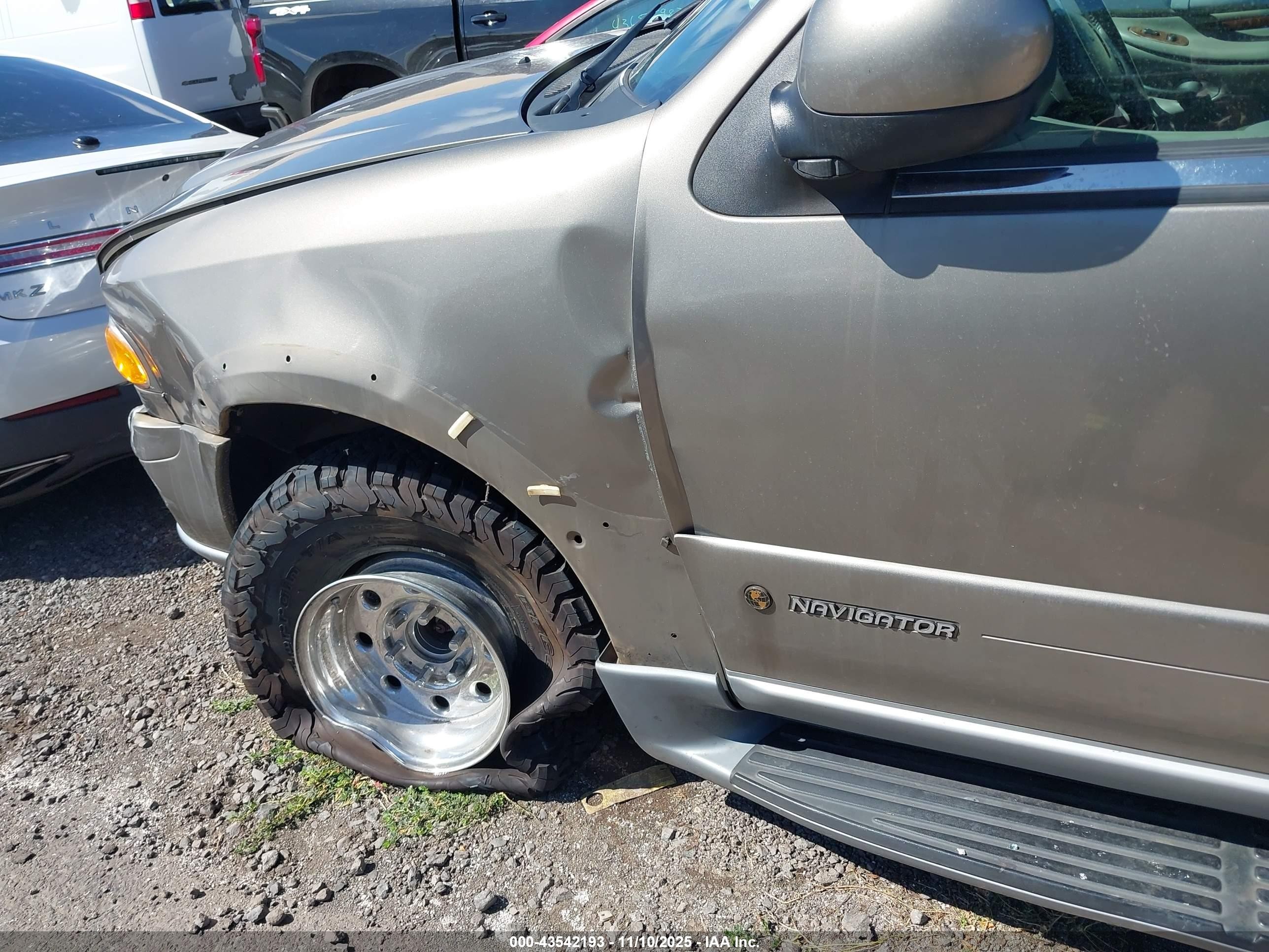 2001 Lincoln Navigator   Tan vin: 5LMFU28A41LJ06337