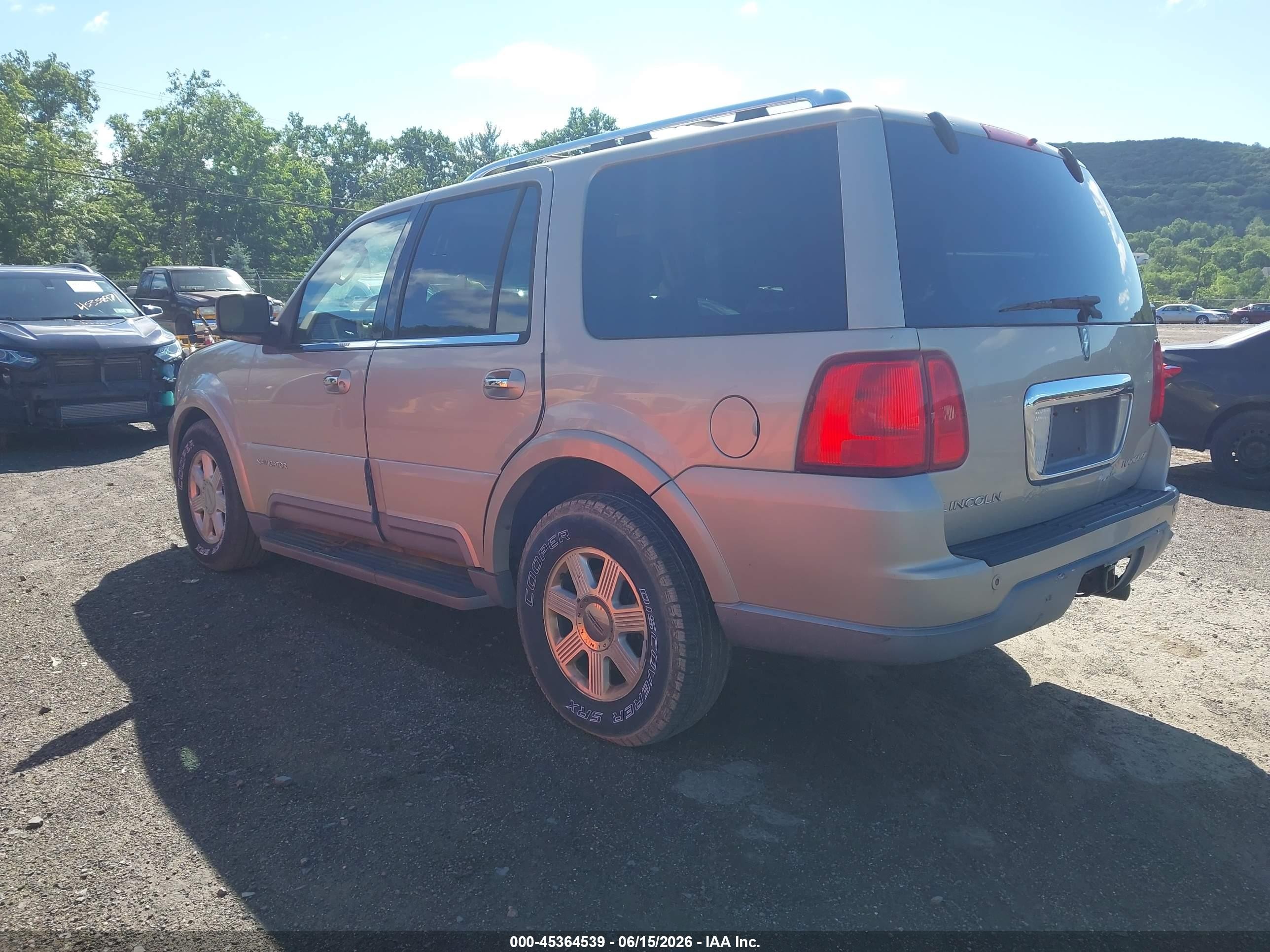 2004 Lincoln Navigator   Gold vin: 5LMFU28R74LJ39052