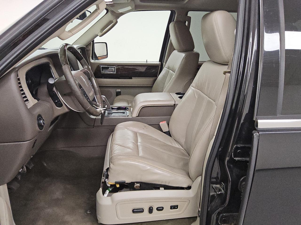 2015 Lincoln Navigator Black vin: 5LMJJ2HT2FEJ05994 Damage: Left Front Seat Molding, Broken, Replacement Required