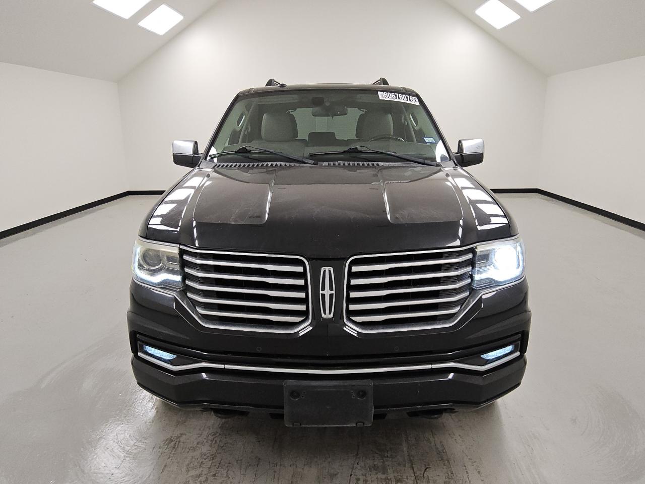 2015 Lincoln Navigator Black vin: 5LMJJ2HT2FEJ05994 Damage: Right Head Lamp, Inoperable, Repair Required