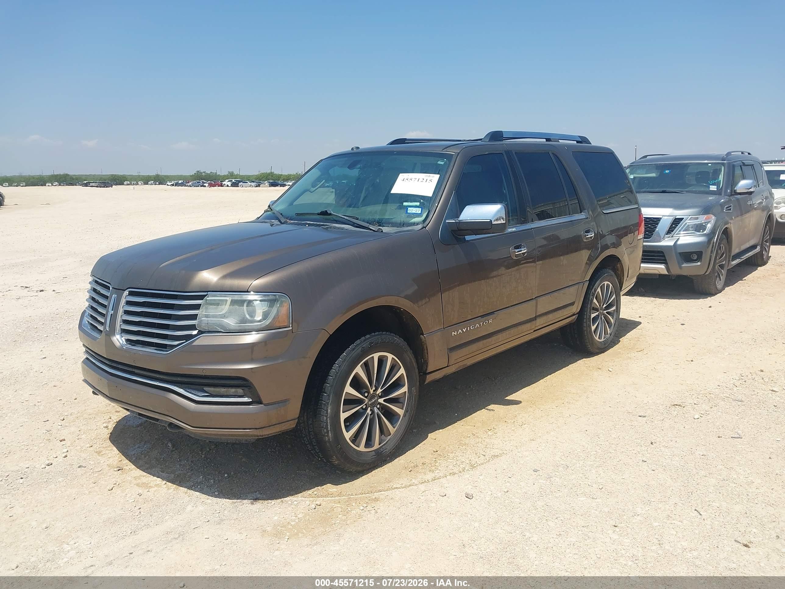 2015 Lincoln Navigator   Желто-коричневый vin: 5LMJJ2HT5FEJ13801