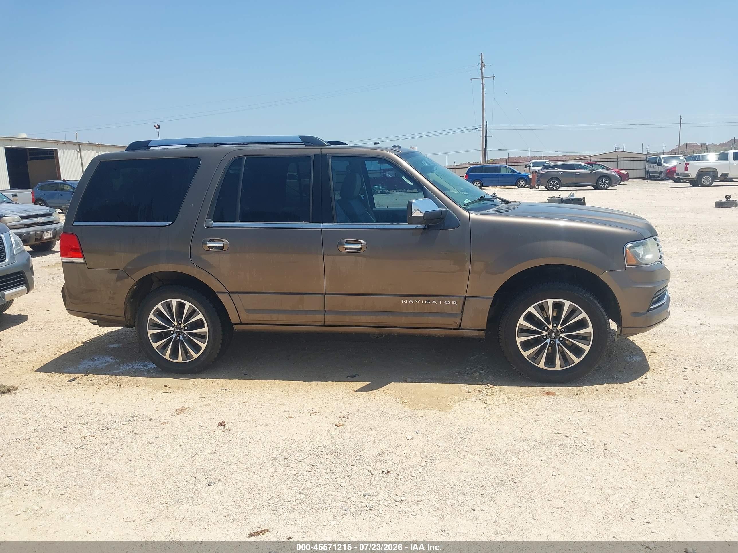 2015 Lincoln Navigator   Желто-коричневый vin: 5LMJJ2HT5FEJ13801