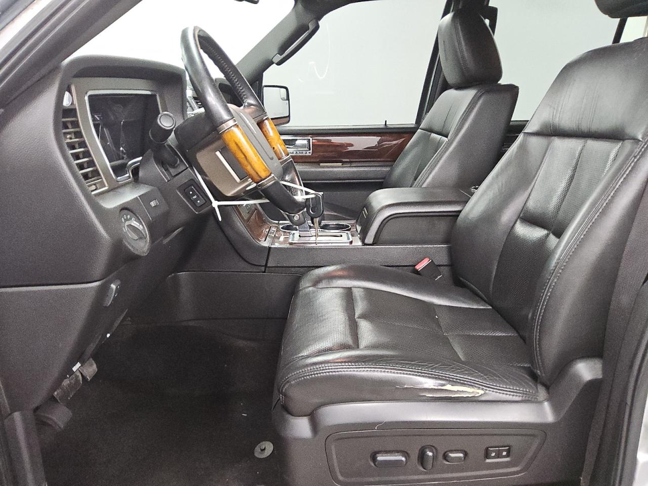 2013 Lincoln Navigator Silver vin: 5LMJJ2J53DEL06036 Damage: Left Front Seat Cushion, Torn, 8 To 9 Inches